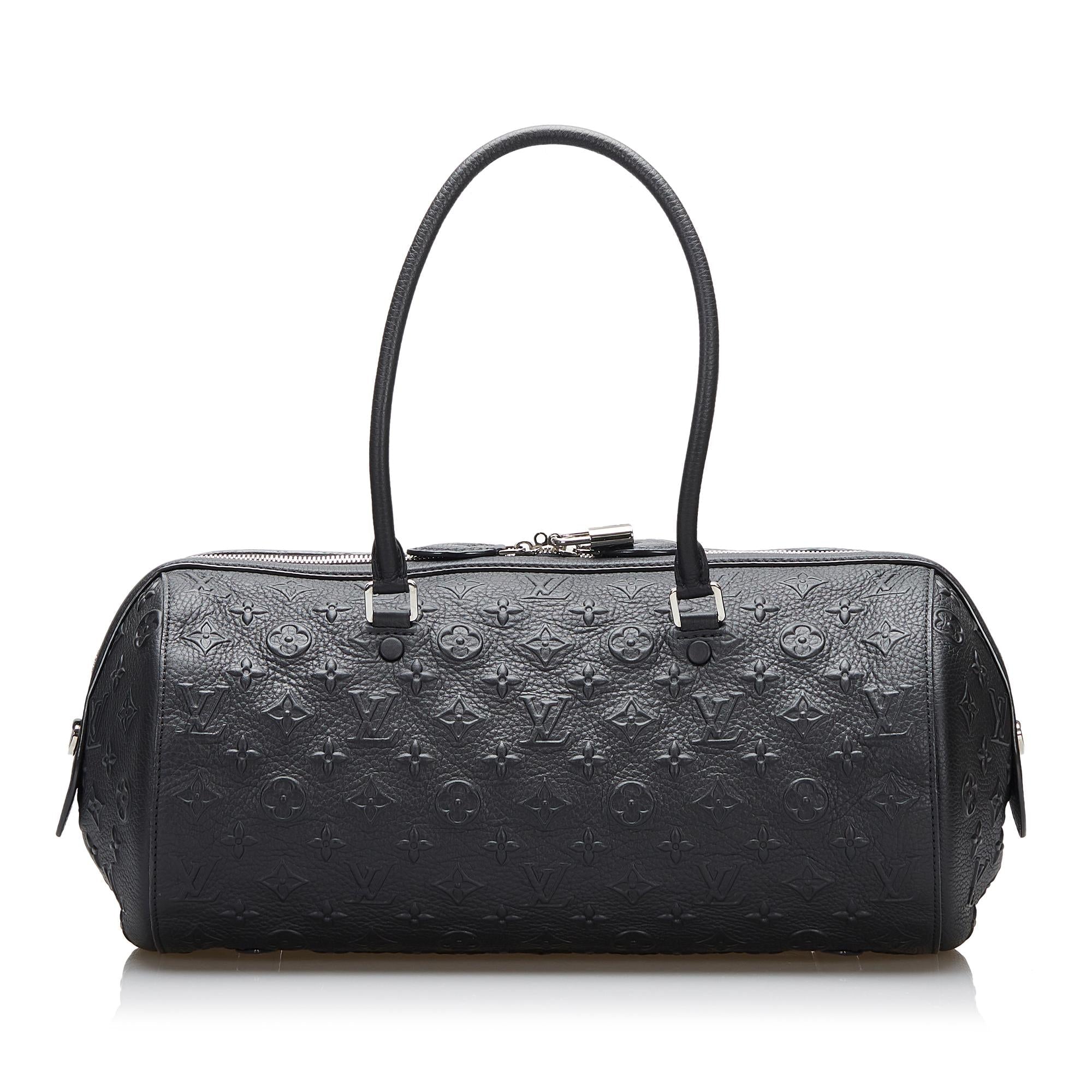 Louis Vuitton Monogram Revelation Neo Papillon GM (SHG-l5AwJx)