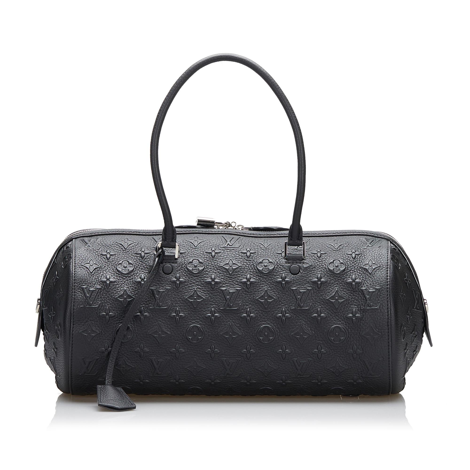 Louis Vuitton Monogram Revelation Neo Papillon GM (SHG-l5AwJx)