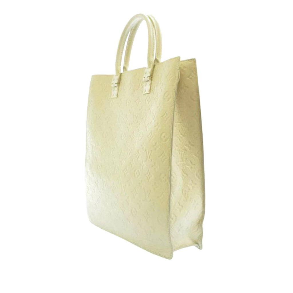 Louis Vuitton Monogram Taurillon Sac Plat (SHG-36681)
