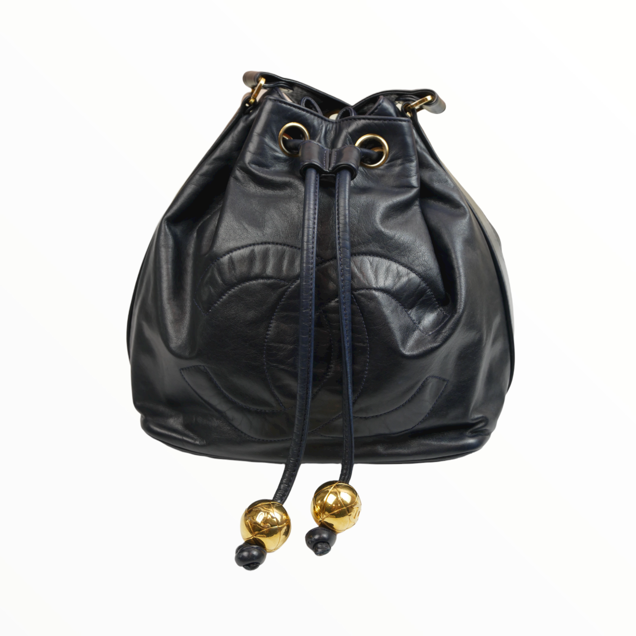Chanel black bucket bag with logo on the front and gold detail - 1980s