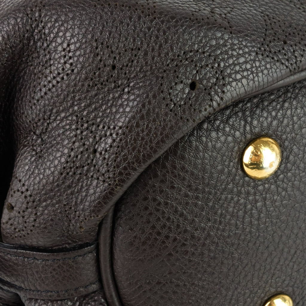 Louis Vuitto Perforated Monogram Mahina Leather XS Bag