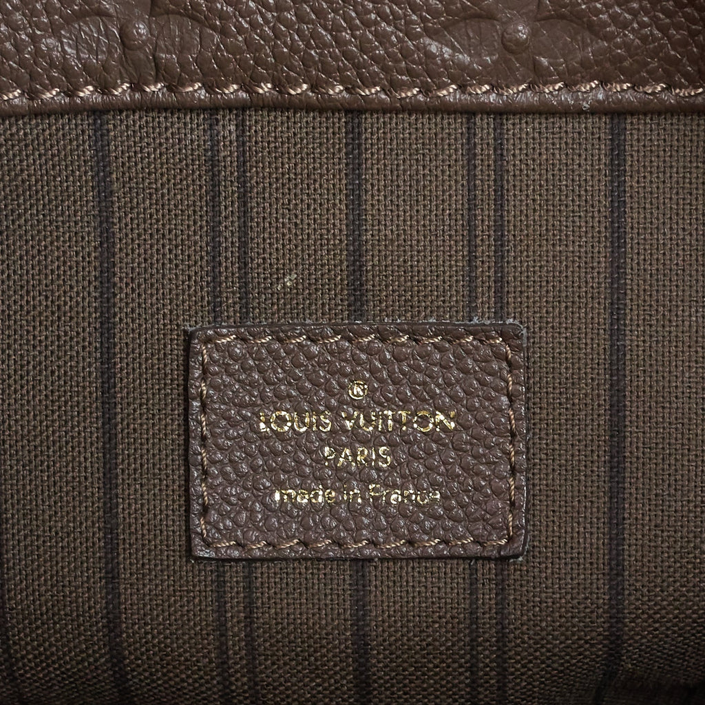 Louis Vuitto Artsy MM Monogram Empreinte Leather Handbag