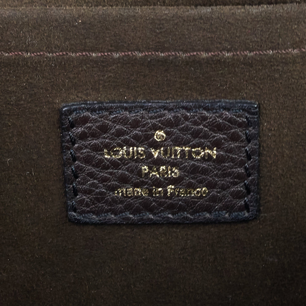 Louis Vuitto Perforated Monogram Mahina Leather XS Bag