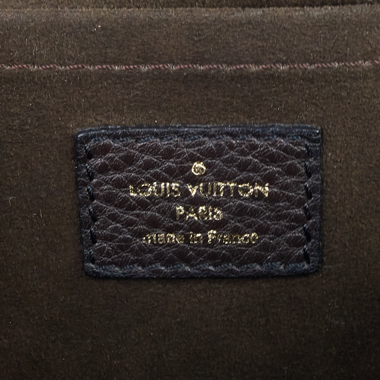 Louis Vuitto Perforated Monogram Mahina Leather XS Bag