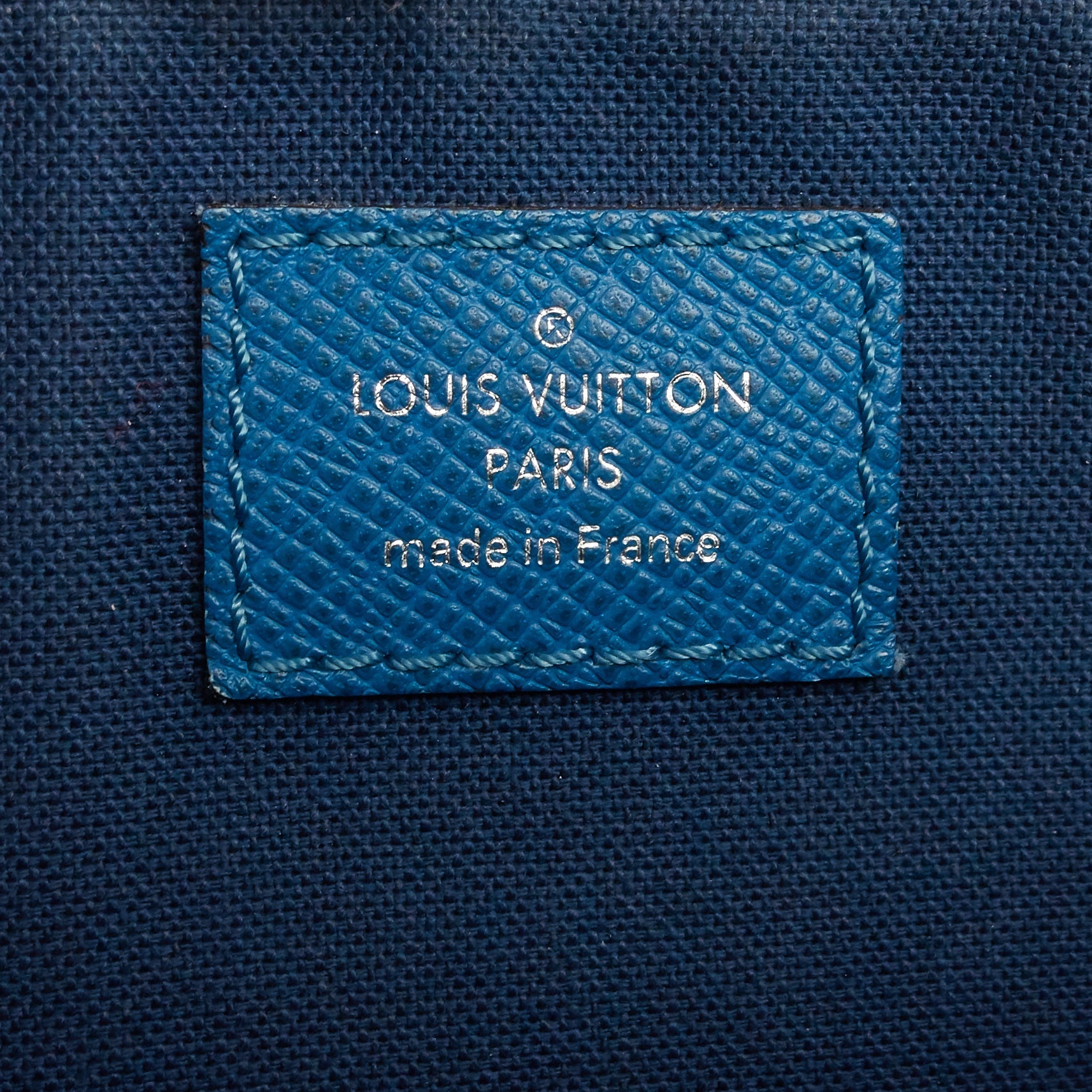 Louis Vuitto Roman PM Taiga Leather Messenger Bag