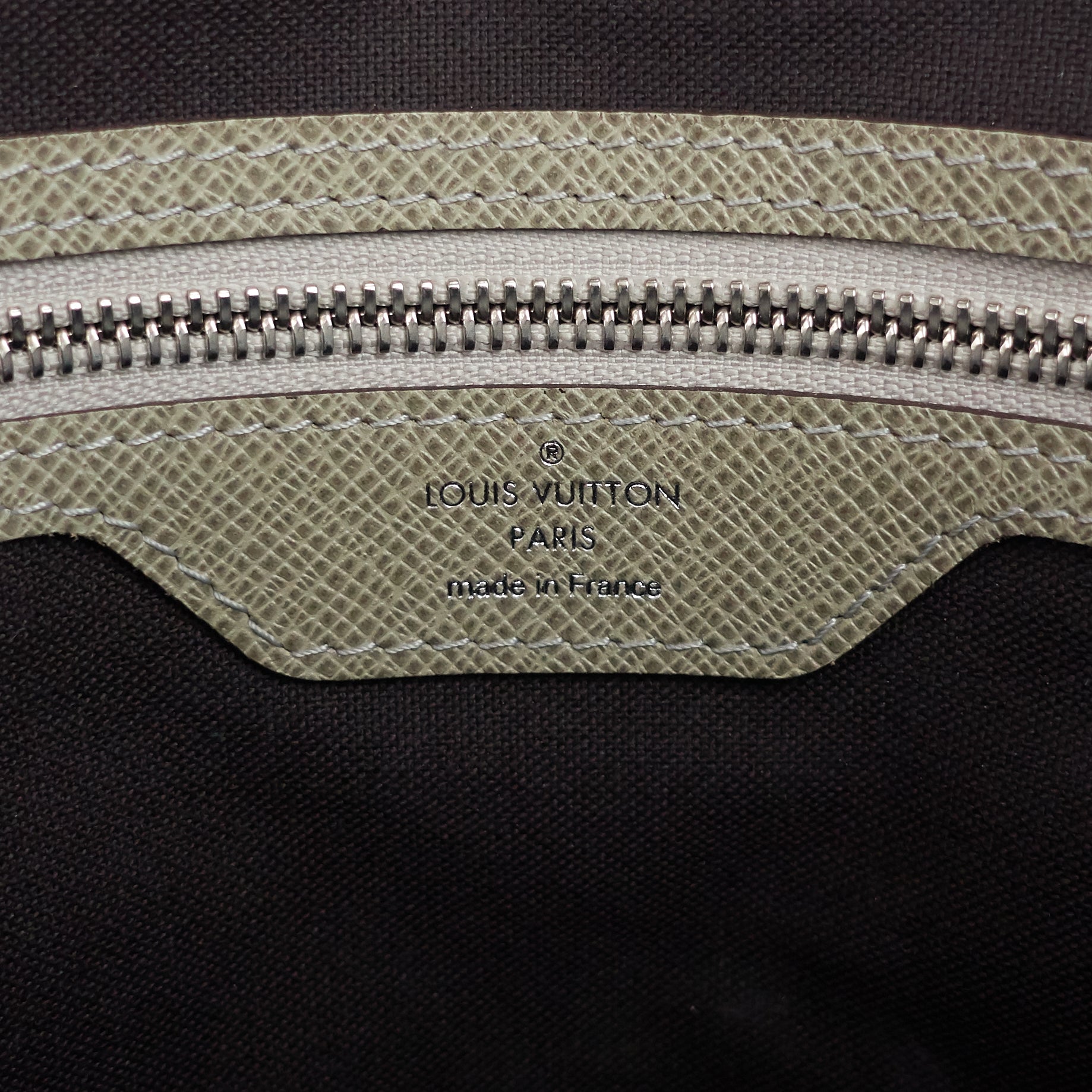 Louis Vuitto Milo Taiga Leather Messenger Bag