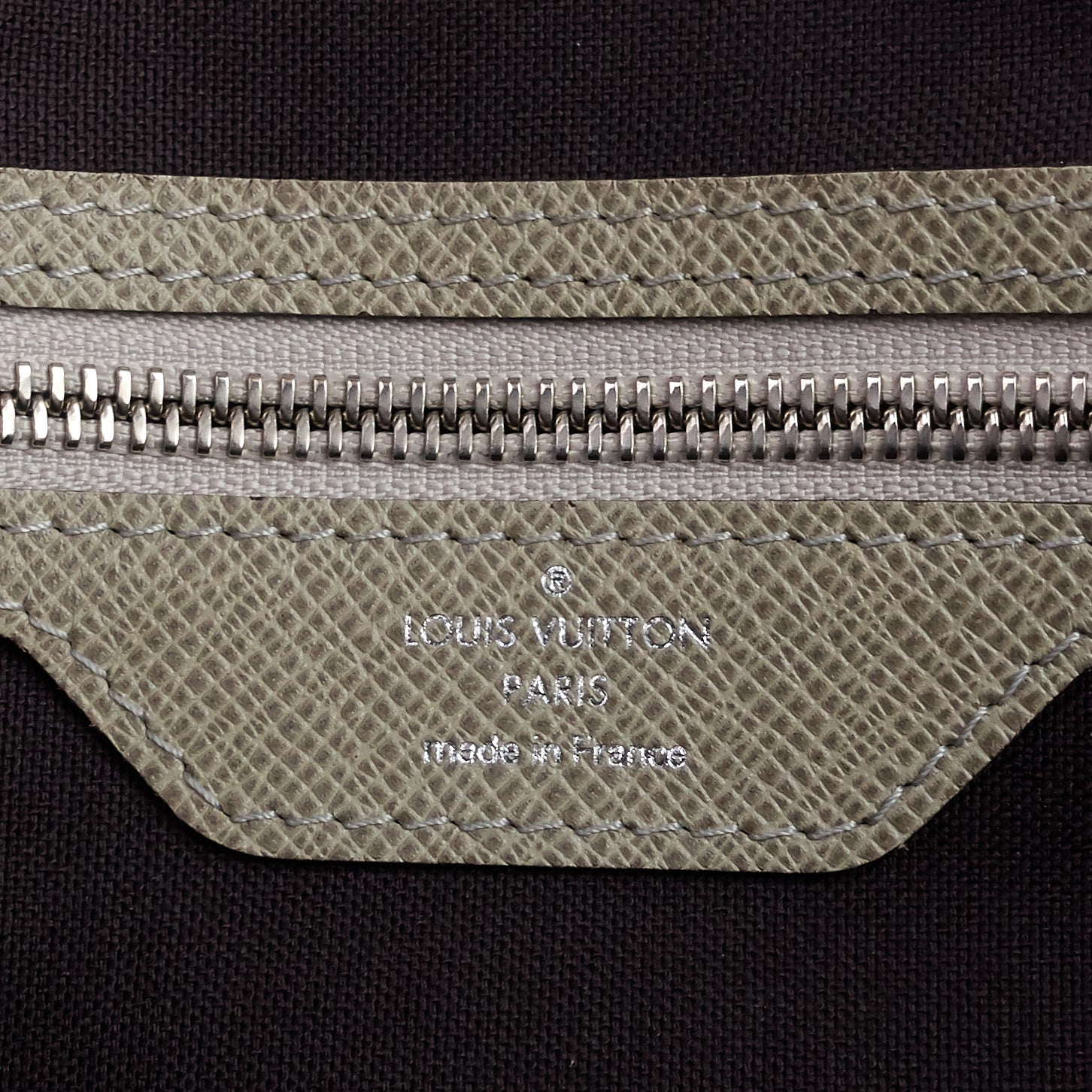 Louis Vuitto Milo Taiga Leather Messenger Bag