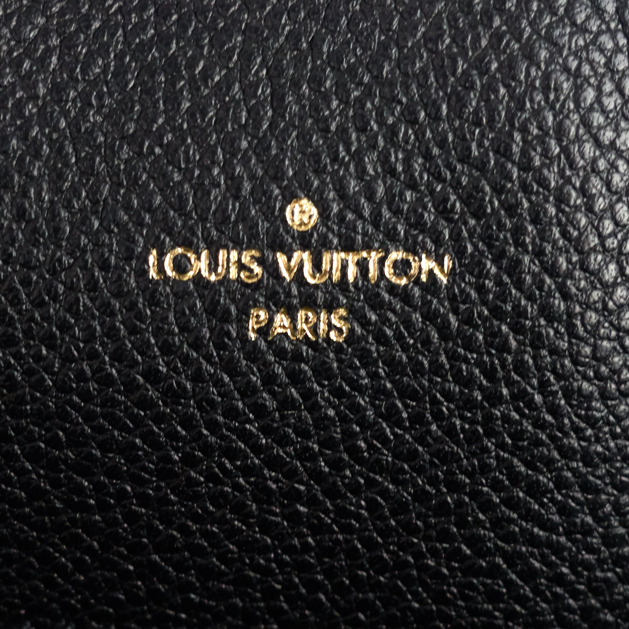Louis Vuitto Bagatelle Monogram Empreinte Leather Bag