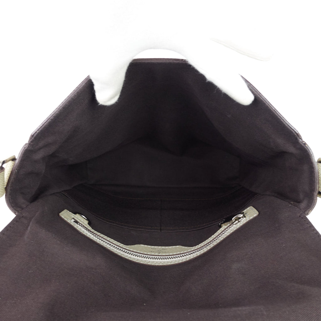 Louis Vuitto Milo Taiga Leather Messenger Bag