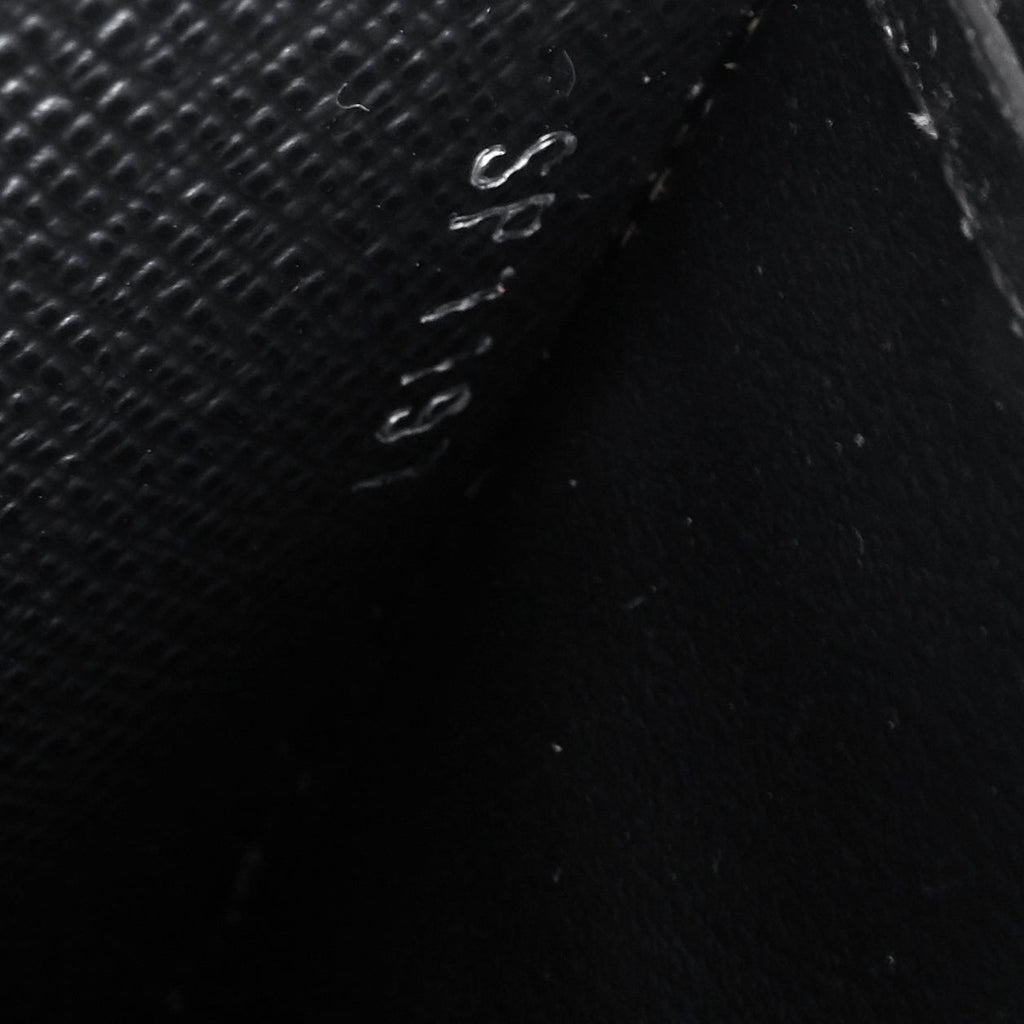 Louis Vuitto Twist Leather and Reverse Monogram Wallet on Chain Bag