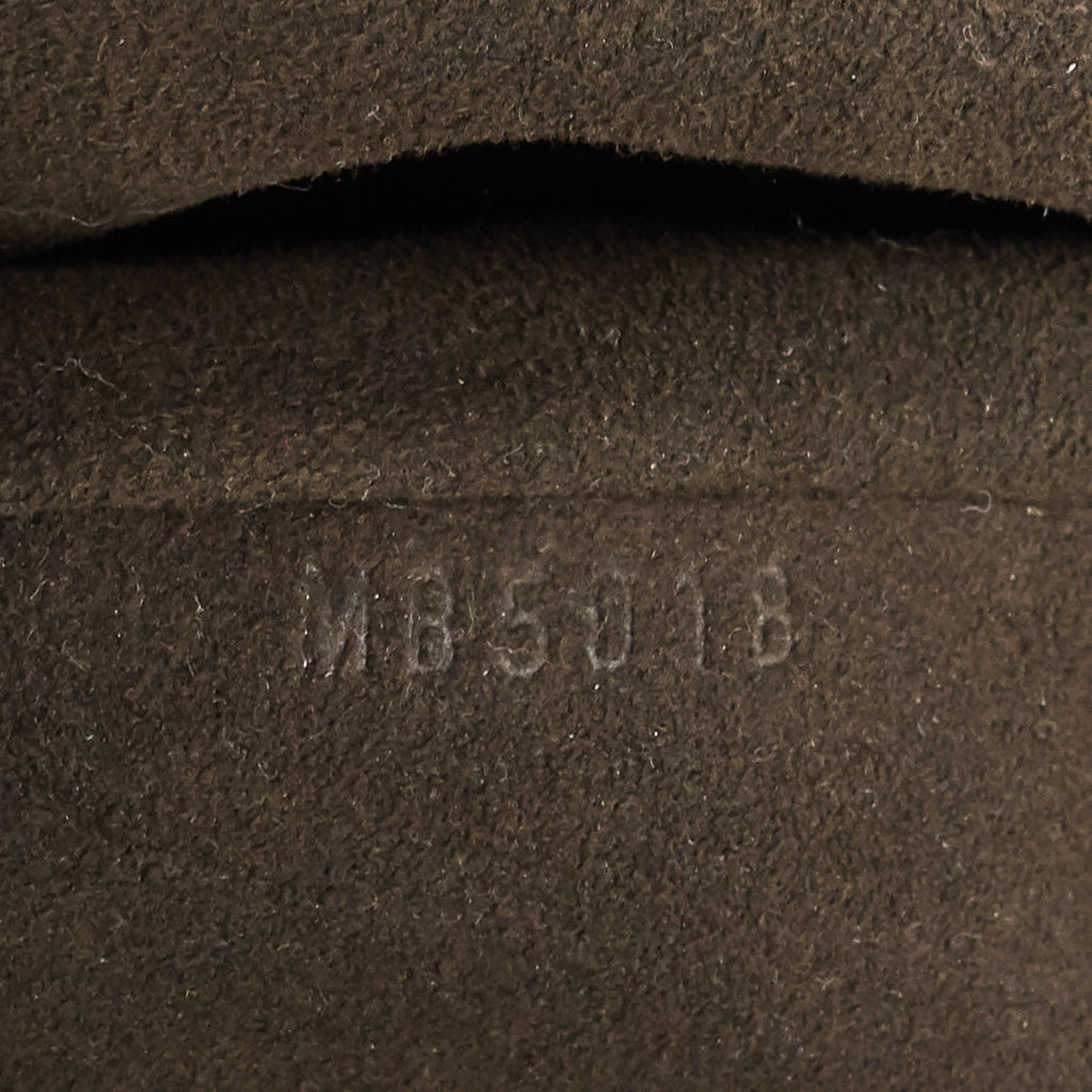 Louis Vuitto Perforated Monogram Mahina Leather XS Bag