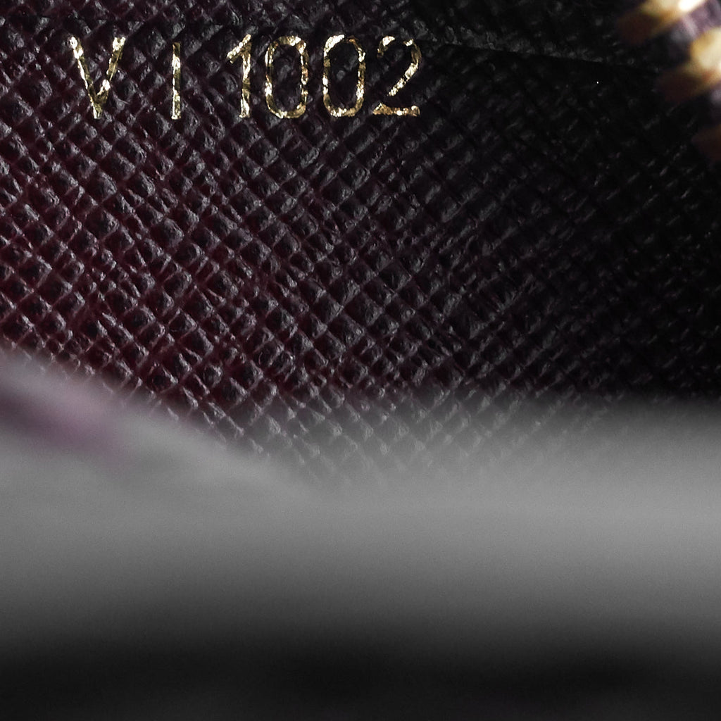 Louis Vuitto Pochette Baikal Acajou Taiga Leather Bag