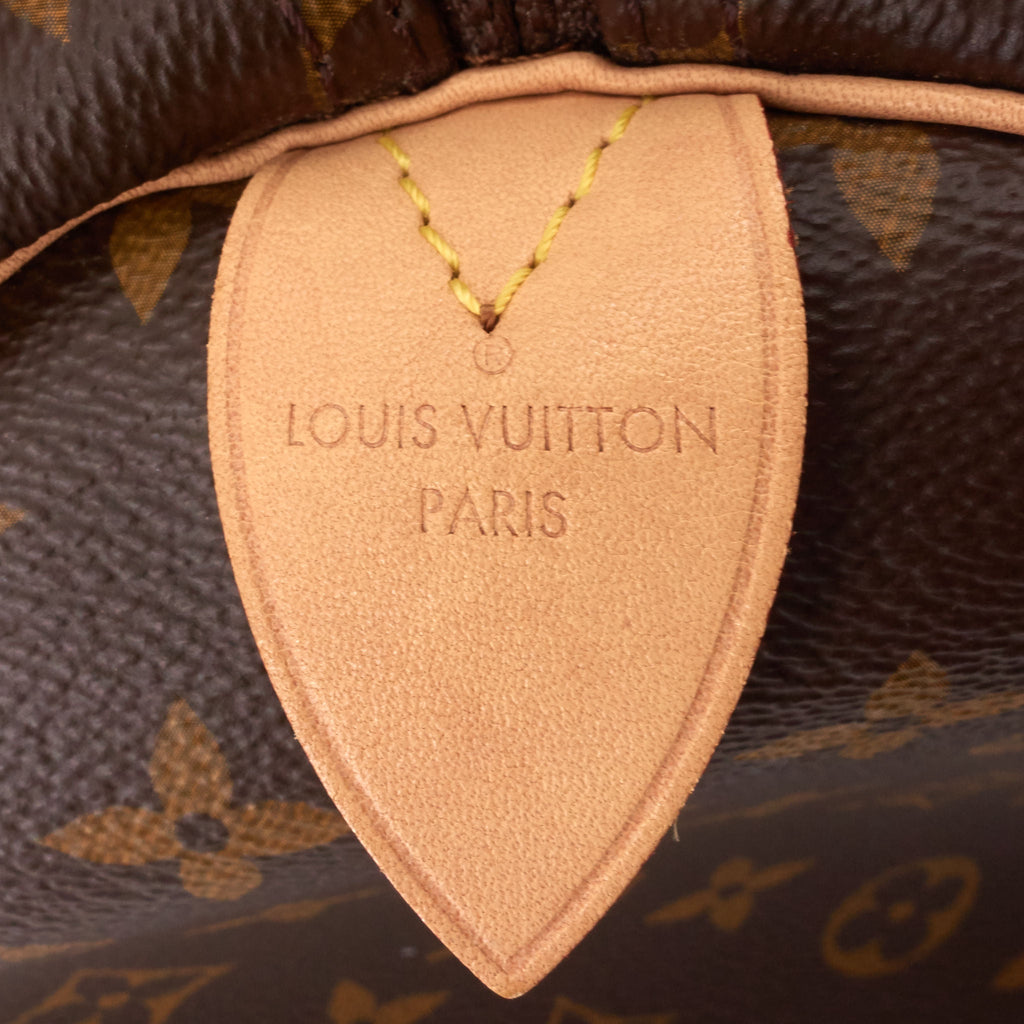 Louis Vuitto Keepall 55 Monogram Canvas Travel Bag