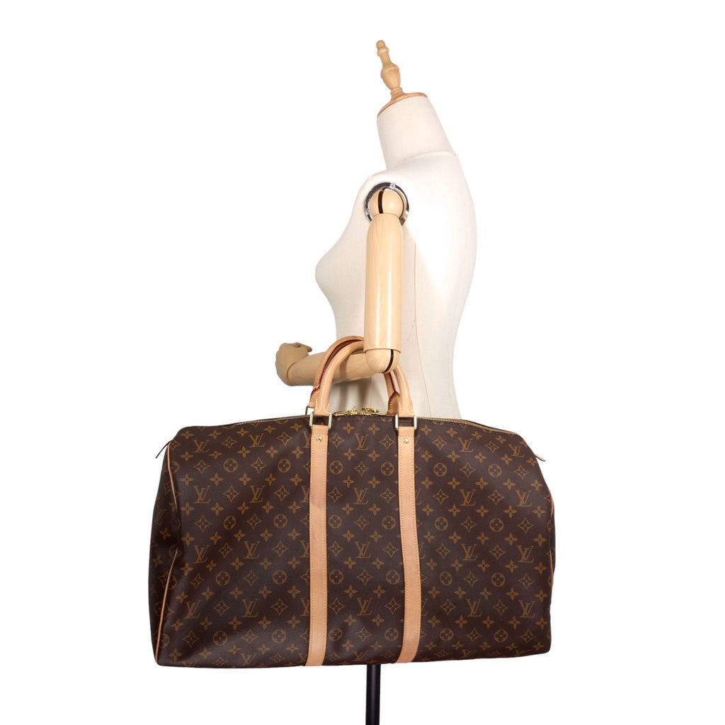Louis Vuitto Keepall 55 Monogram Canvas Travel Bag