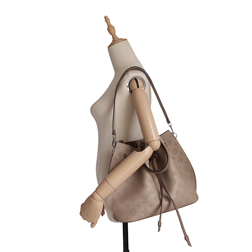 Louis Vuitto Perforated Monogram Girolata Bag with Pouch
