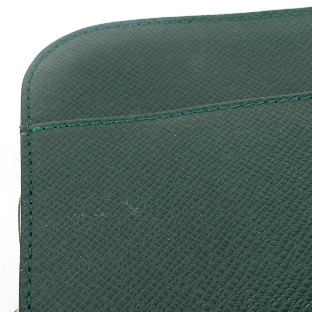 Louis Vuitto Pochette Baikal Epicea Taiga Leather Bag