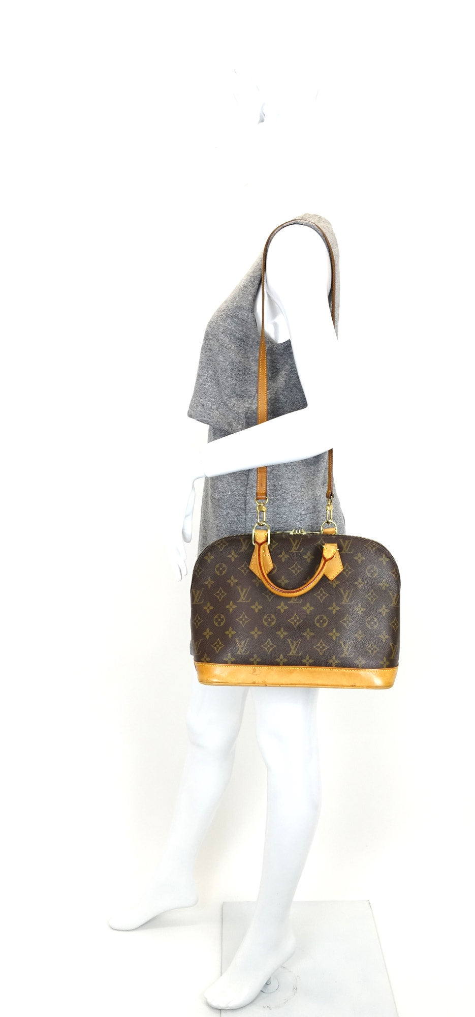 Louis Vuitto Alma Monogram Canvas Handbag with Strap
