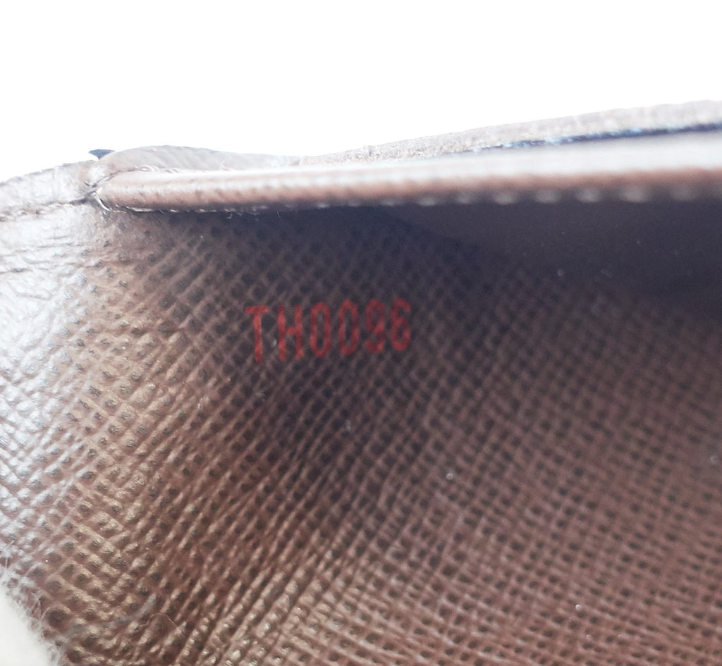 Louis Vuitto Porte Tresor International Damier Ebene Canvas Wallet