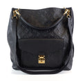 Louis Vuitto Metis Monogram Empreinte Leather Hobo Bag