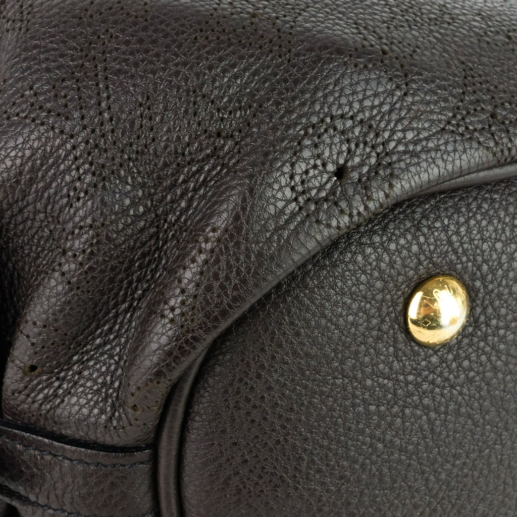 Louis Vuitto Perforated Monogram Mahina Leather XS Bag