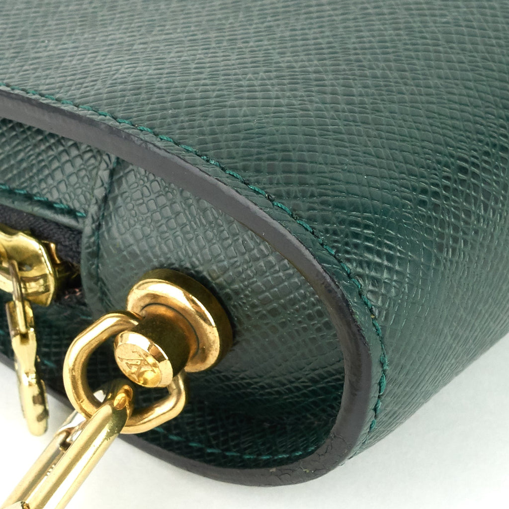 Louis Vuitto Pochette Baikal Epicea Taiga Leather Bag