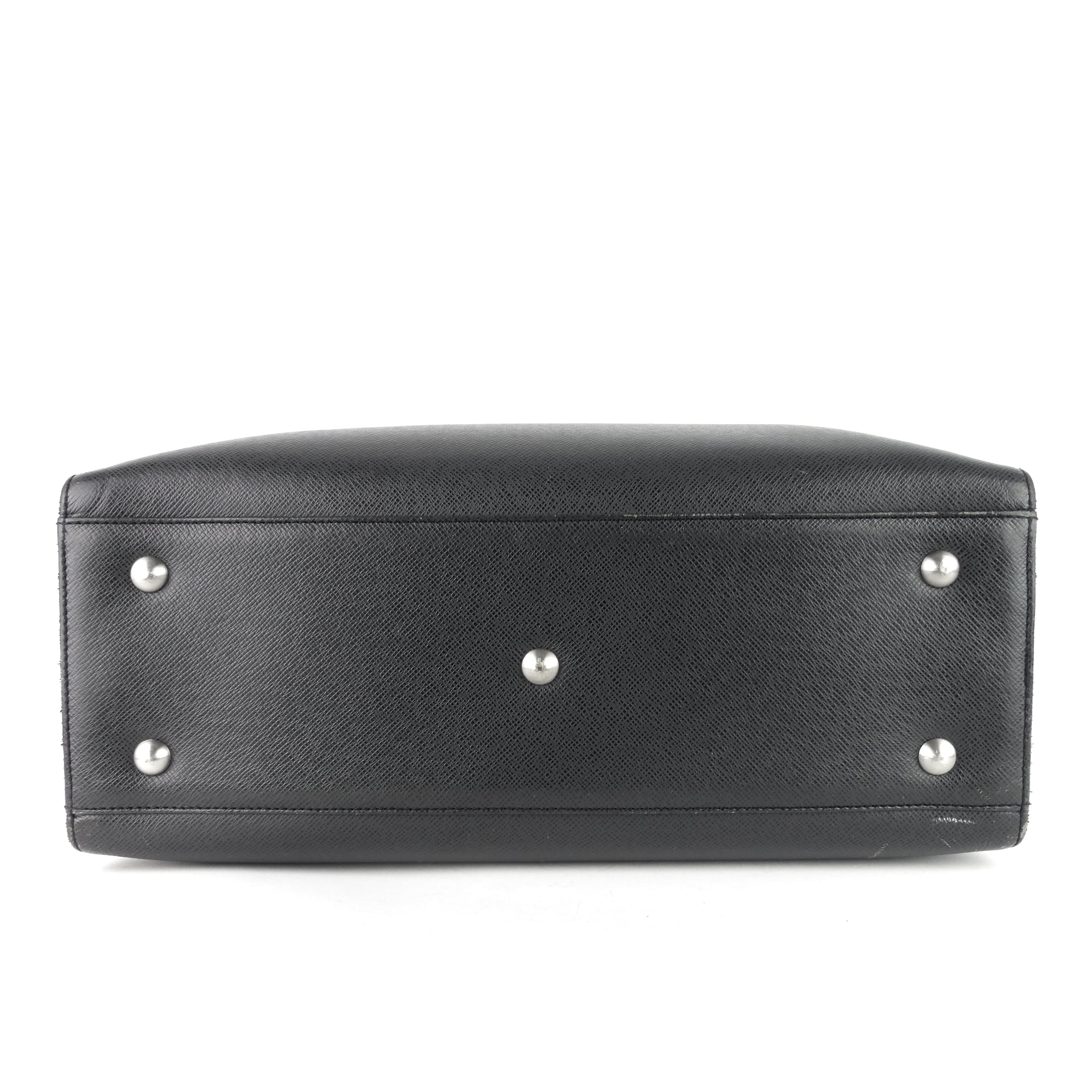 Louis Vuitto Nevski Taiga Leather Briefcase Bag