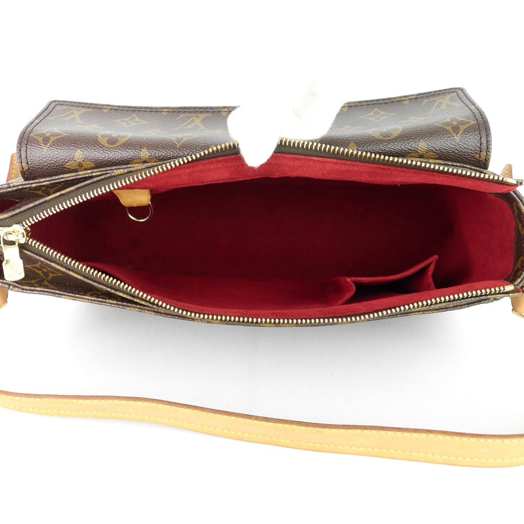 Louis Vuitto Viva Cite GM Monogram Canvas Bag