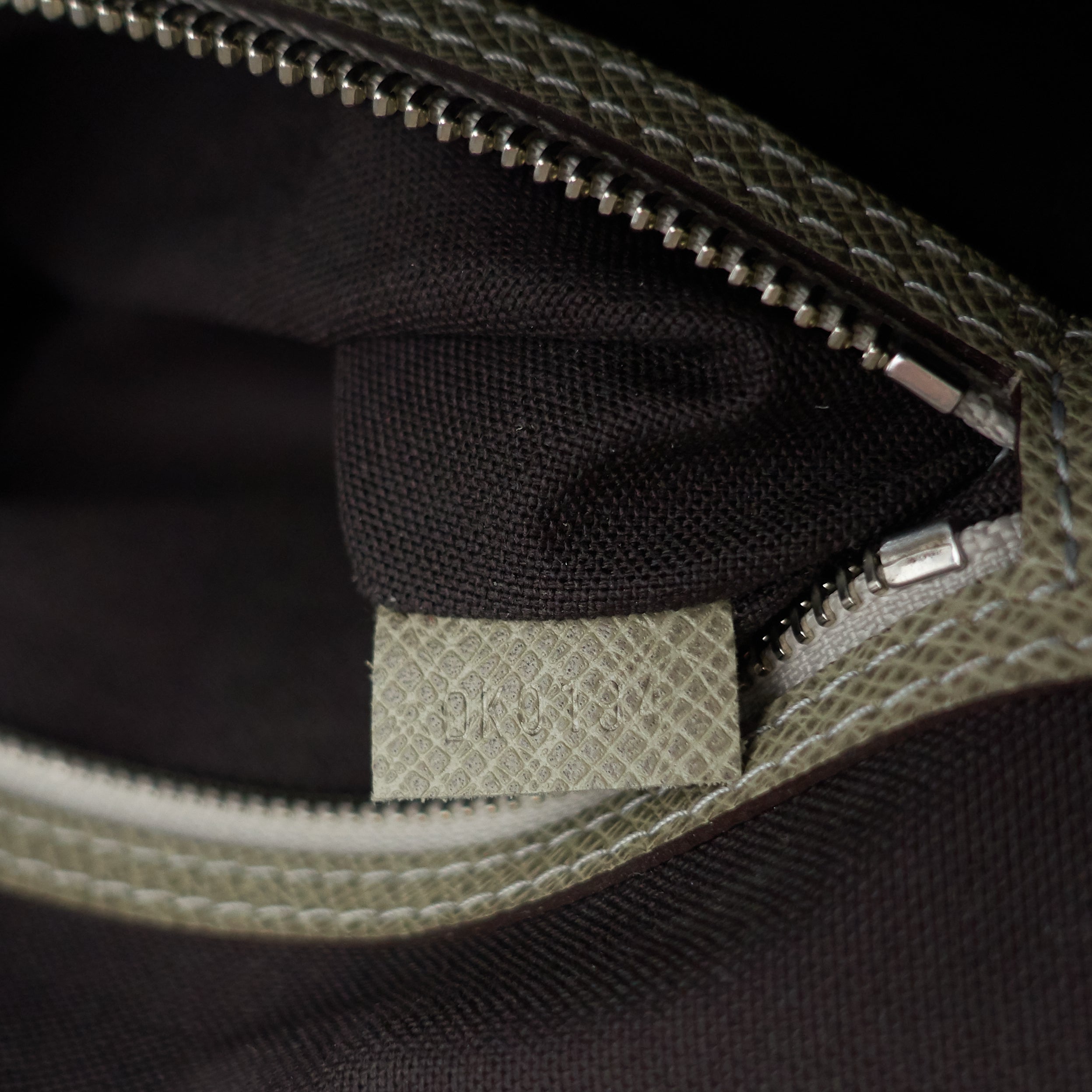 Louis Vuitto Milo Taiga Leather Messenger Bag