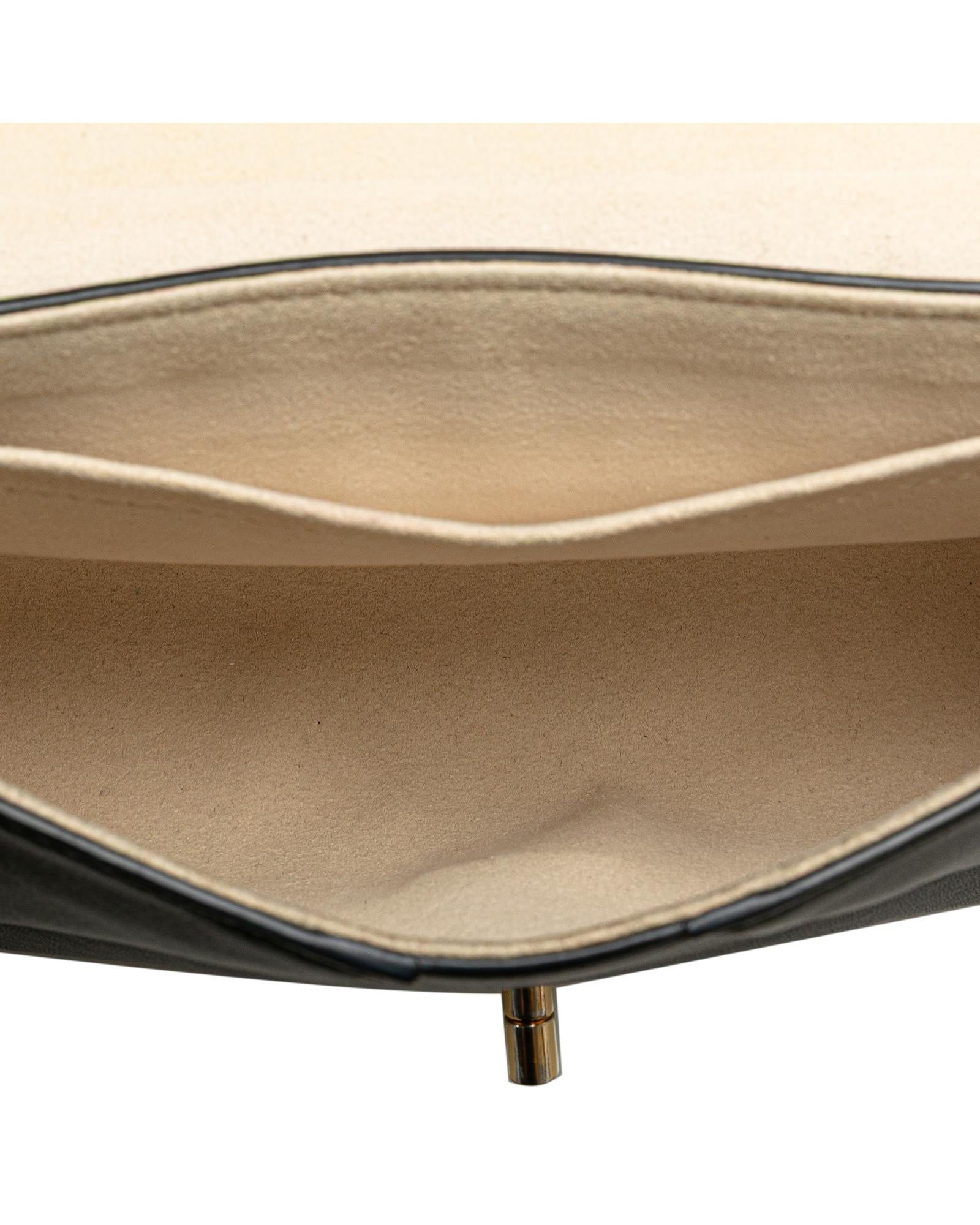 Embellished Leather Bag with Detachable Chain Strap and Twist Lock Closure