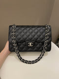 Chanel Classic Quilted Jumbo Double Flap Black Caviar