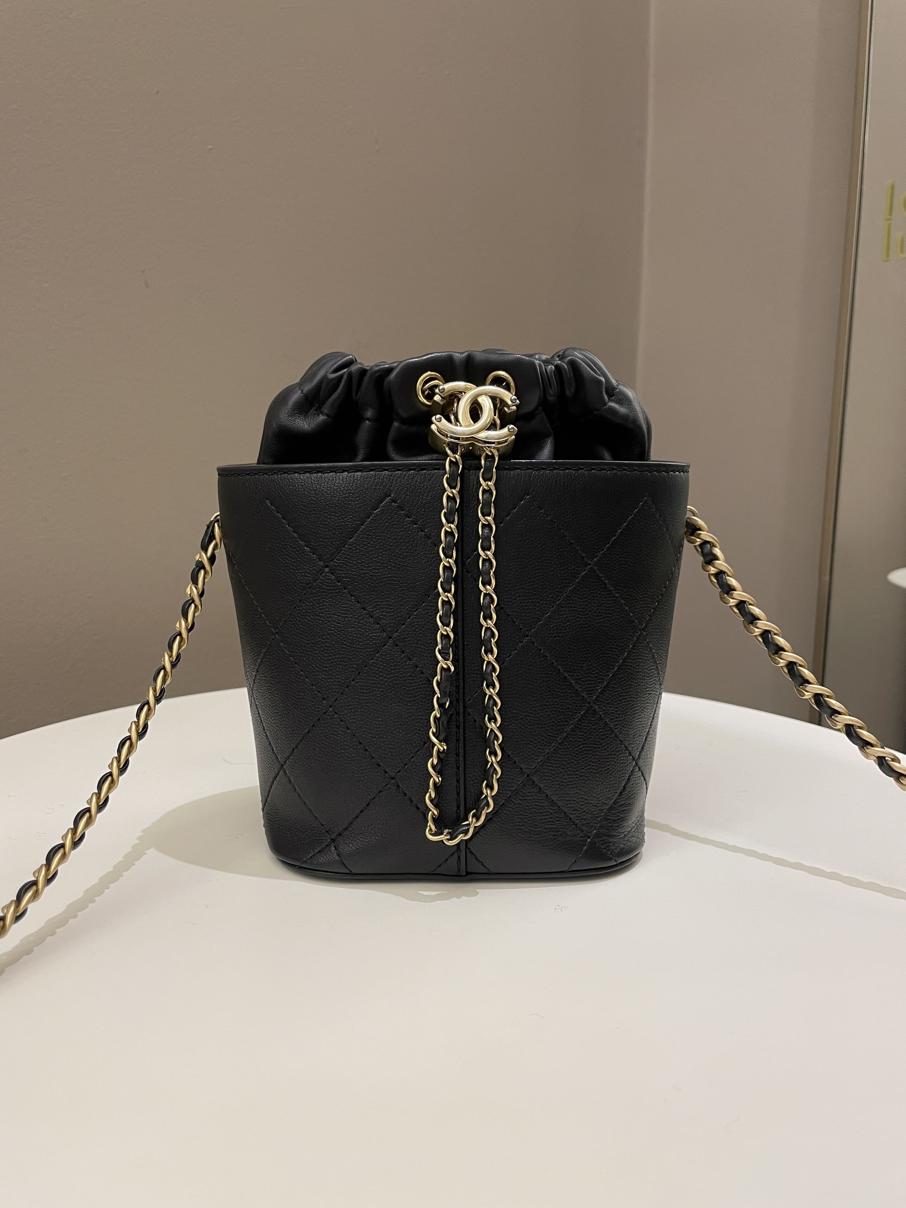 Chanel Cc Quilted Drawstring Bucket Black Caviar / Lambskin