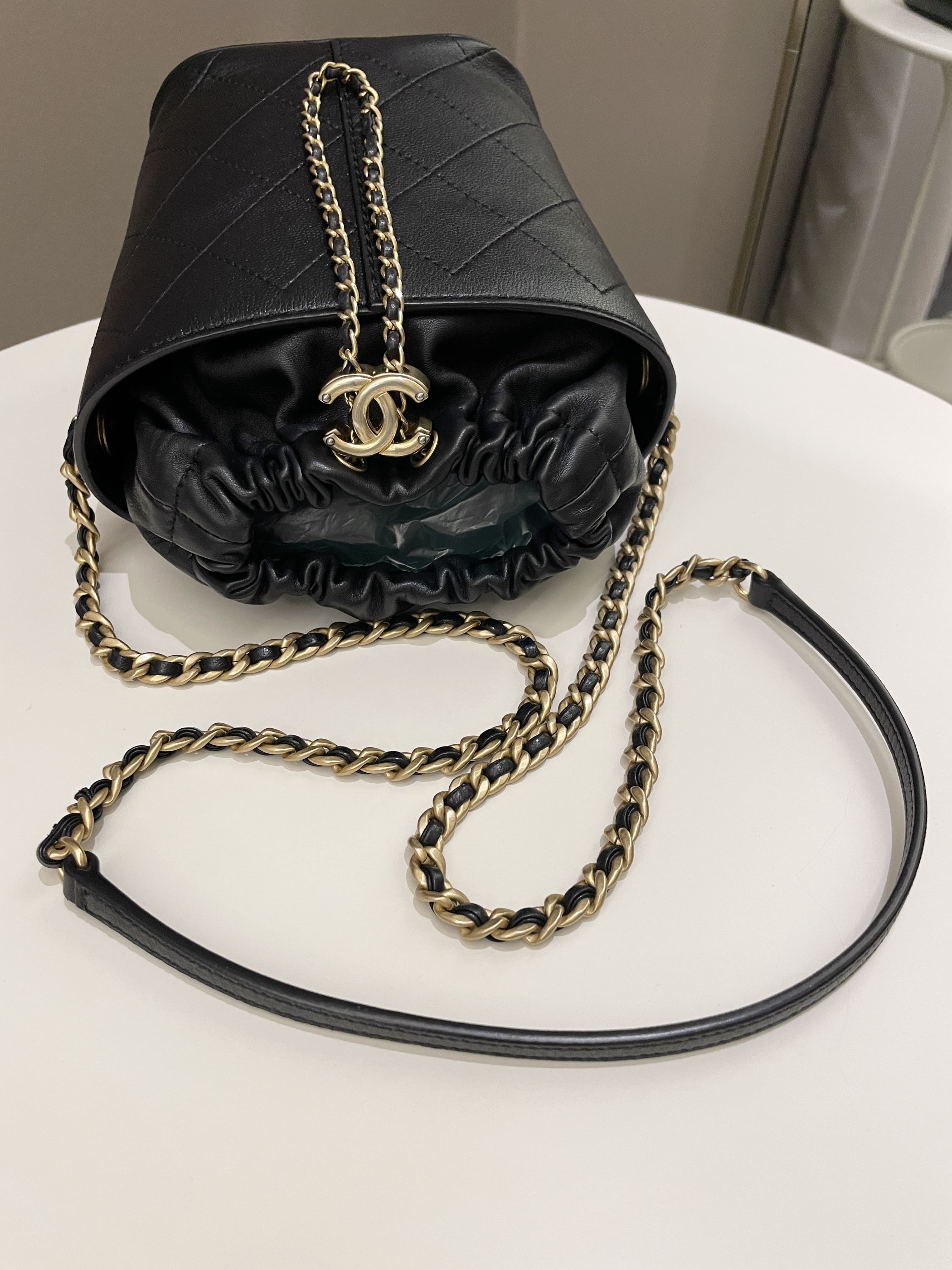 Chanel Cc Quilted Drawstring Bucket Black Caviar / Lambskin