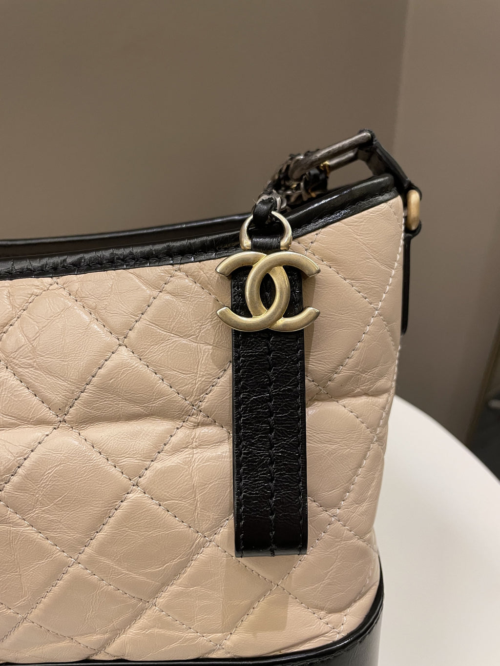 Chanel Quilted Gabrielle Hobo Beige / Black Aged Calfskin