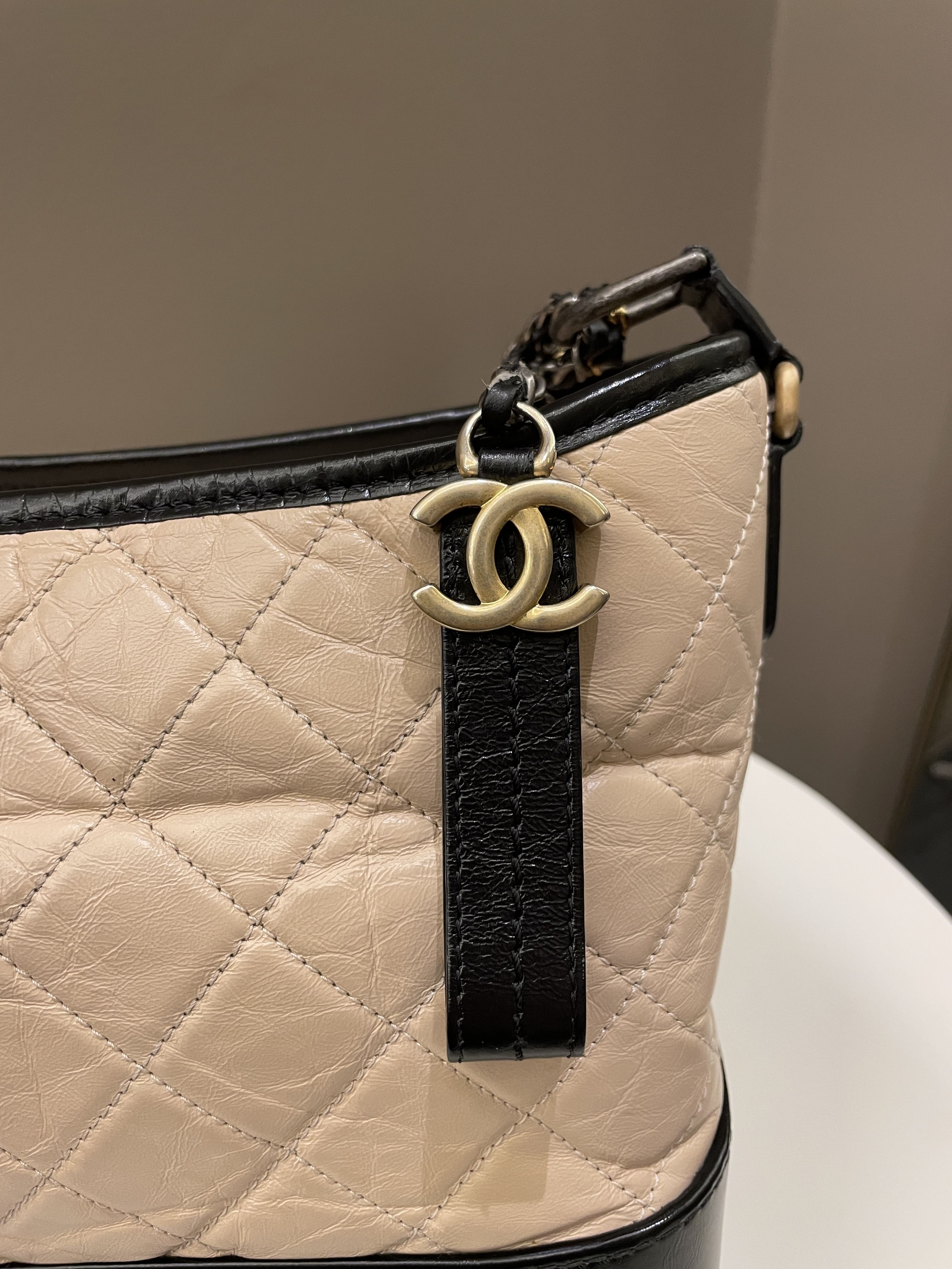 Chanel Quilted Gabrielle Hobo Beige / Black Aged Calfskin