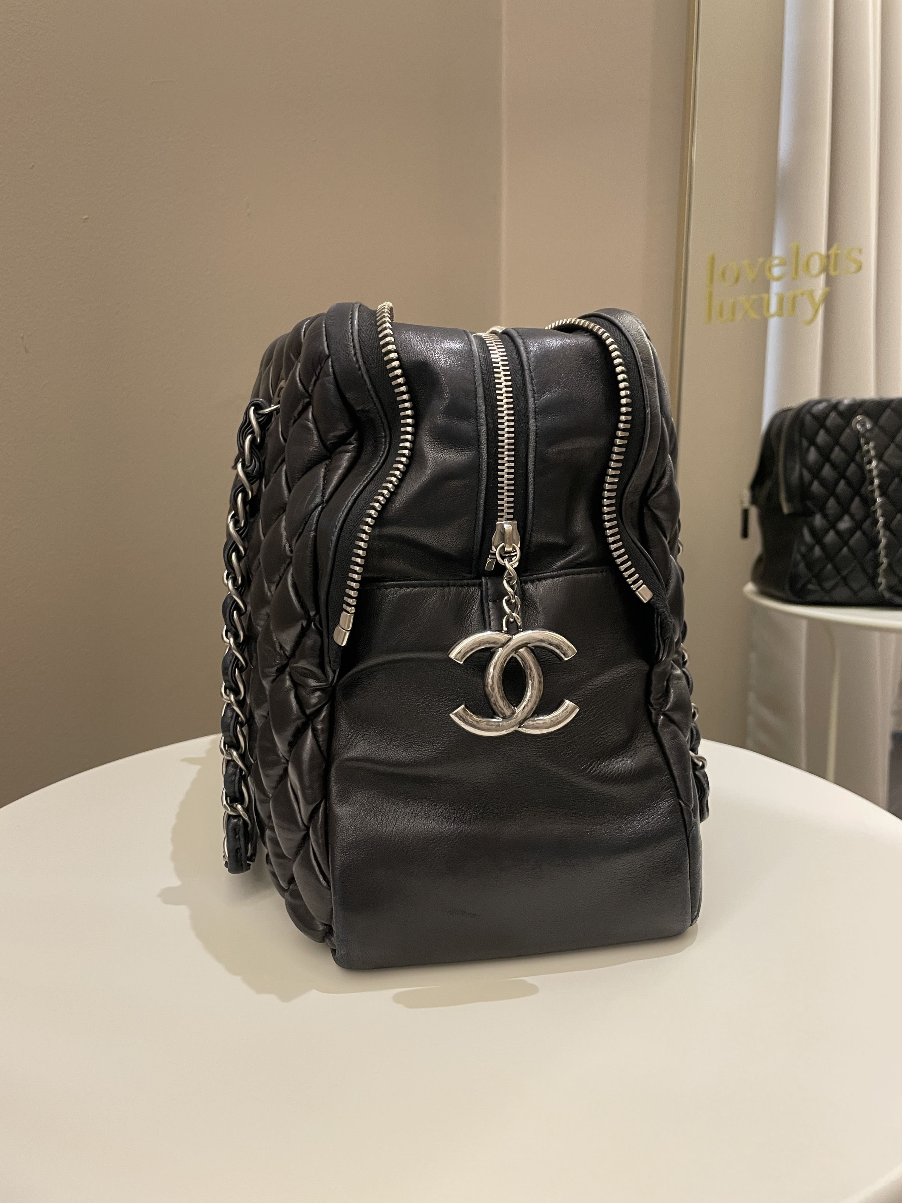 Chanel Dual Zip Quilted Bowling Bag Black Lambskin