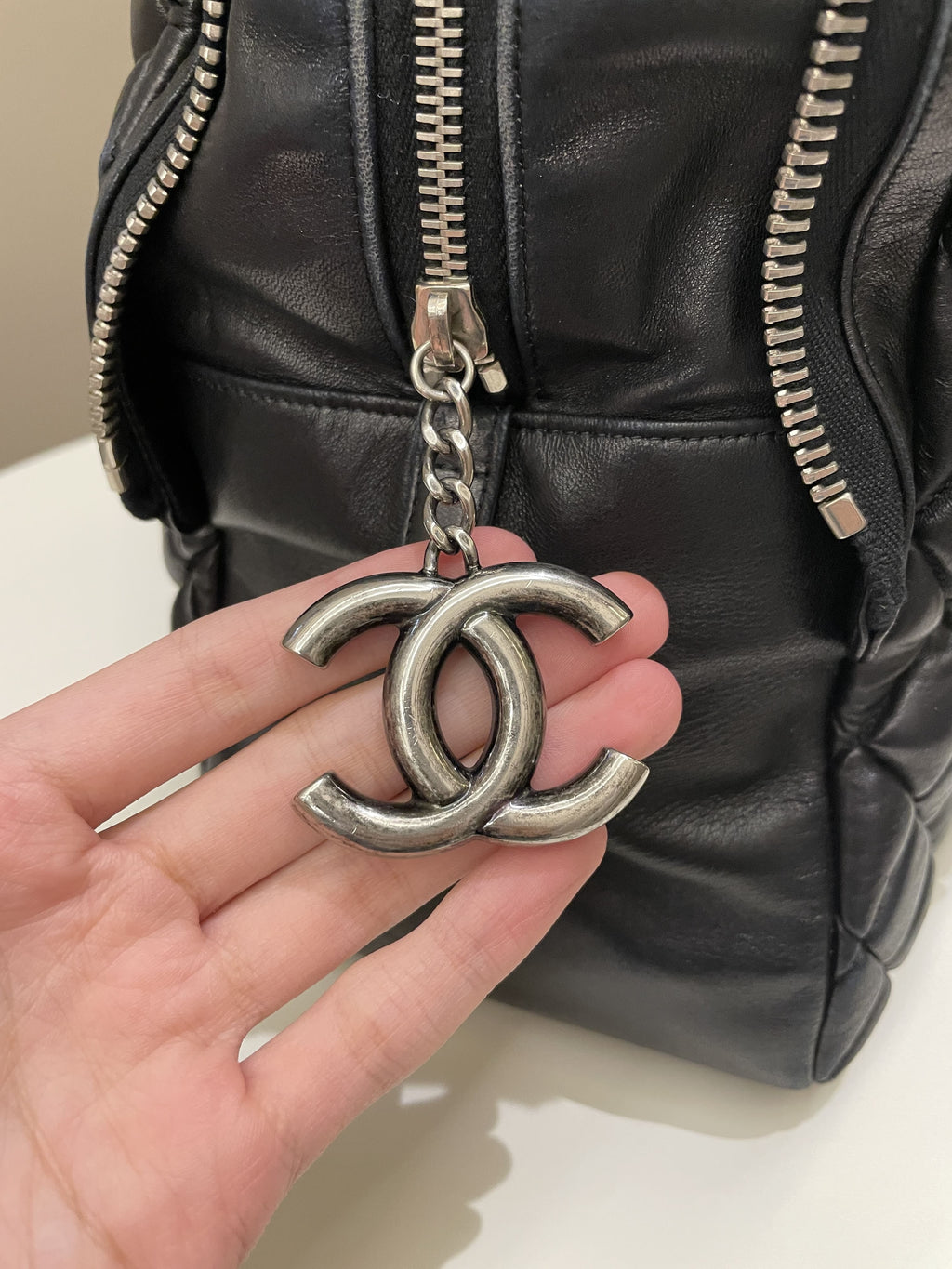 Chanel Dual Zip Quilted Bowling Bag Black Lambskin