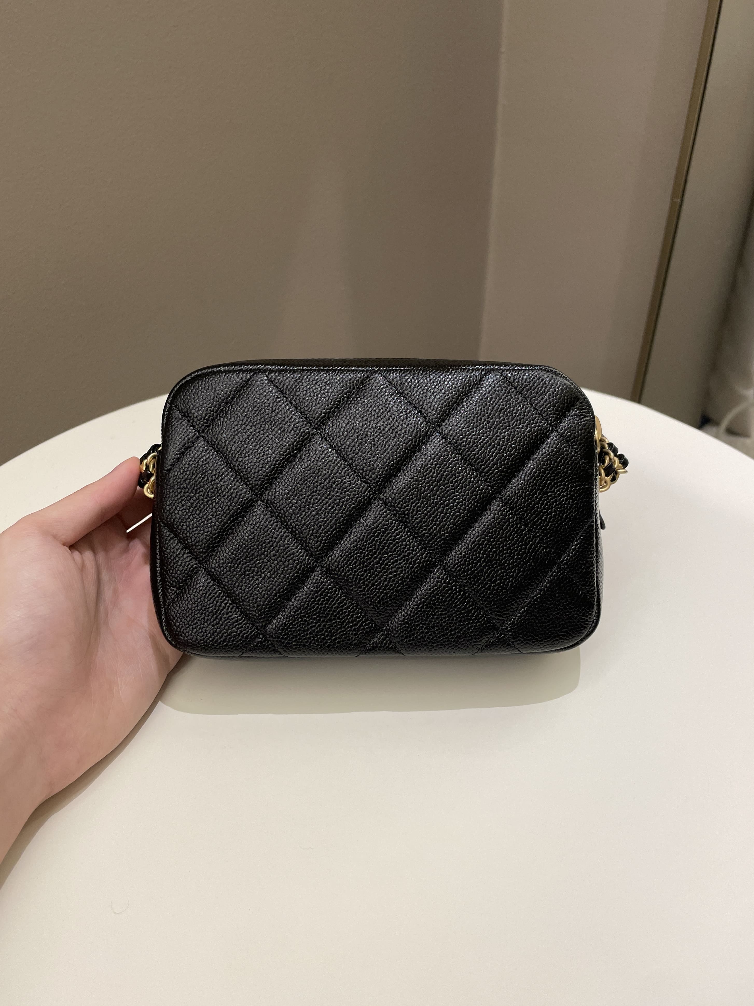 Chanel 22P Quilted Camera Sling Bag Black Caviar