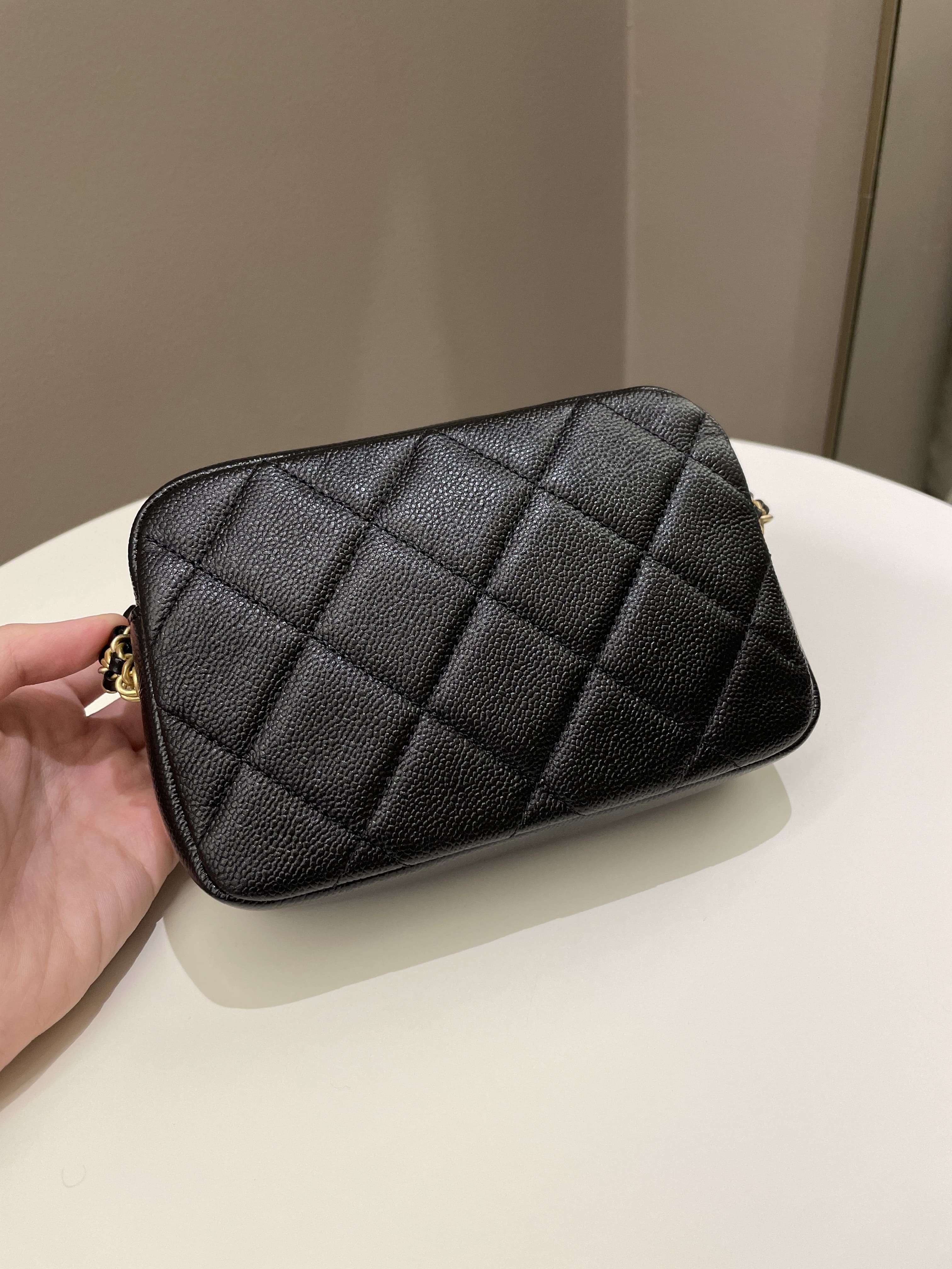 Chanel 22P Quilted Camera Sling Bag Black Caviar