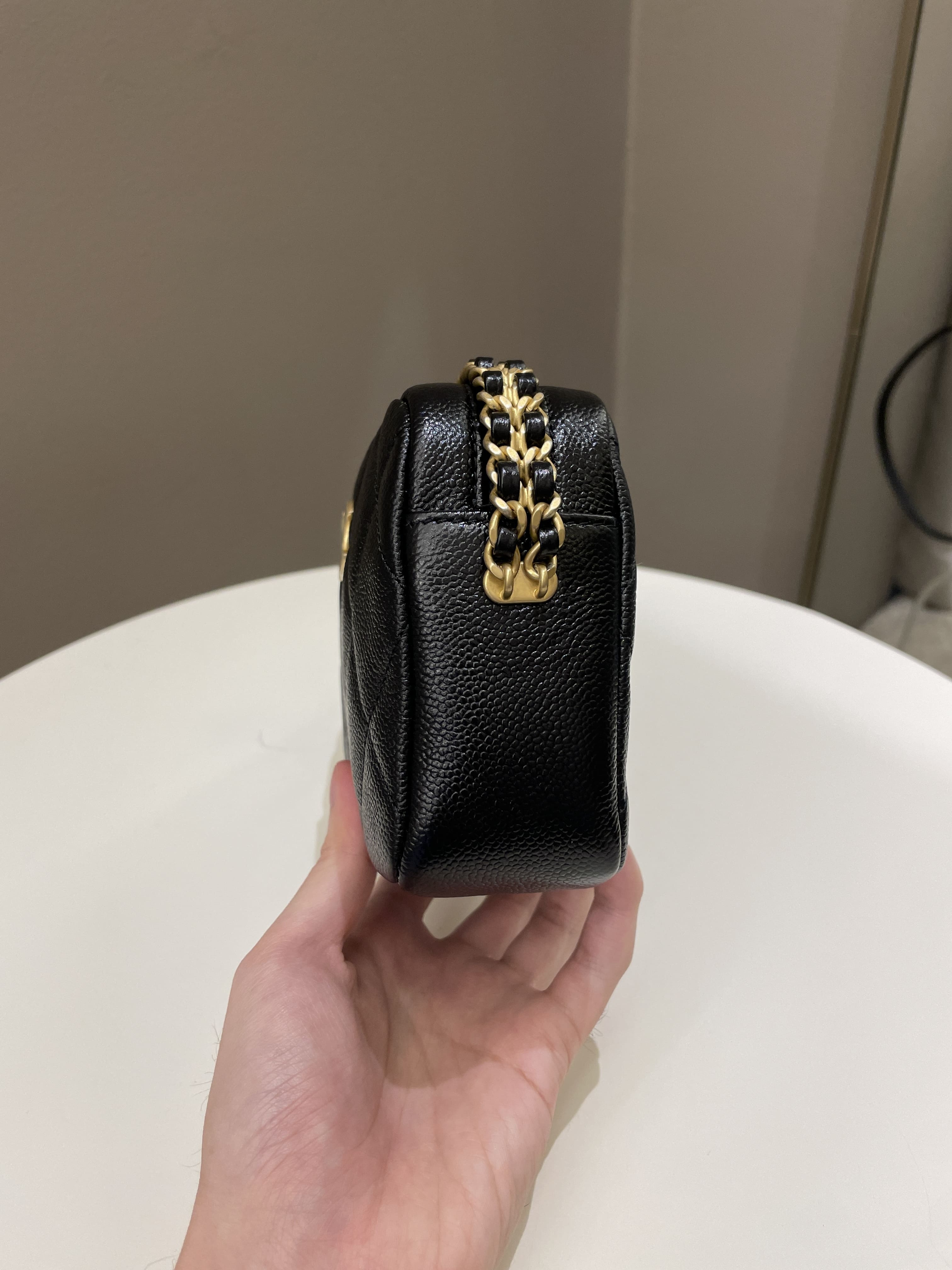 Chanel 22P Quilted Camera Sling Bag Black Caviar