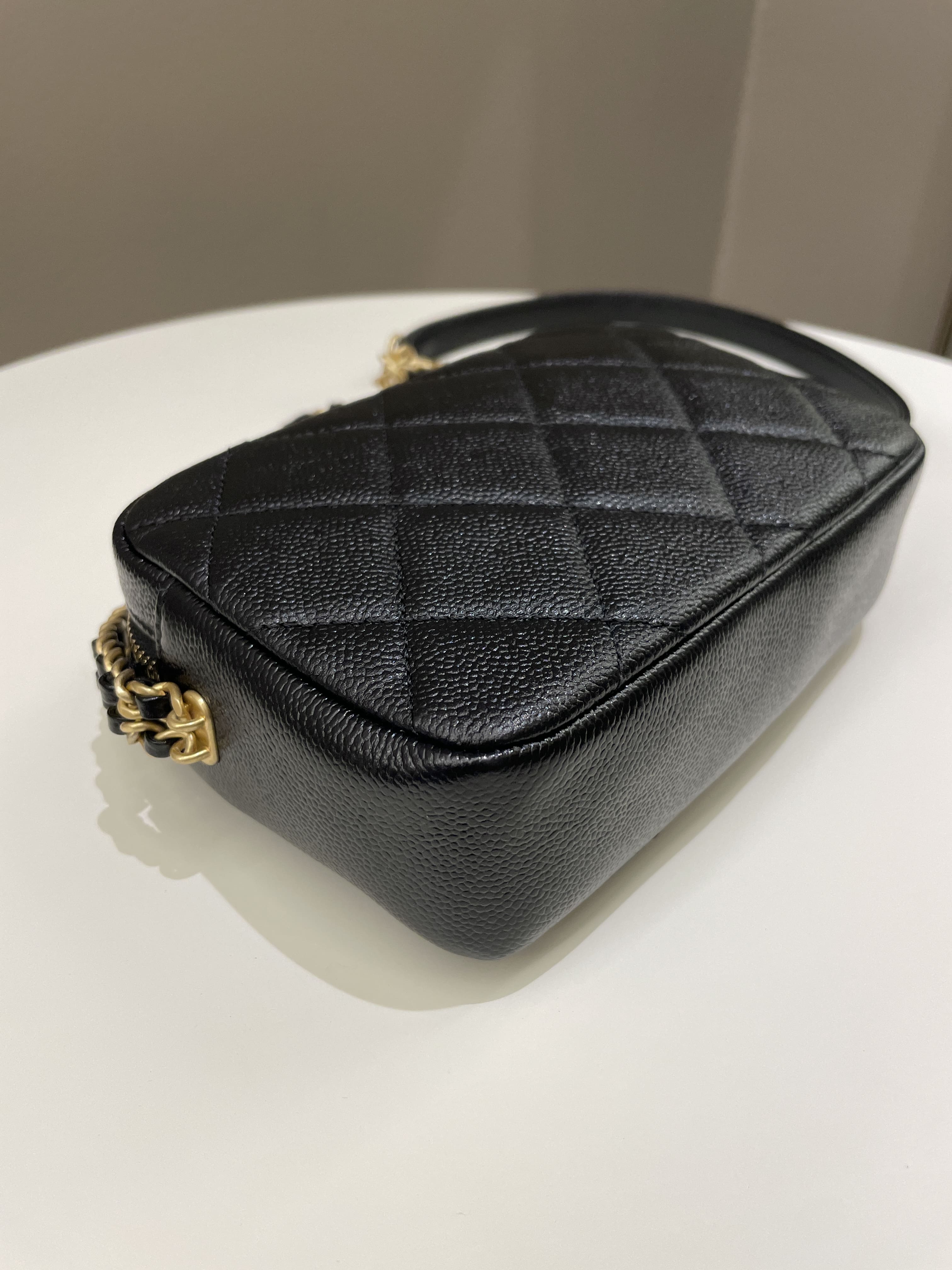 Chanel 22P Quilted Camera Sling Bag Black Caviar