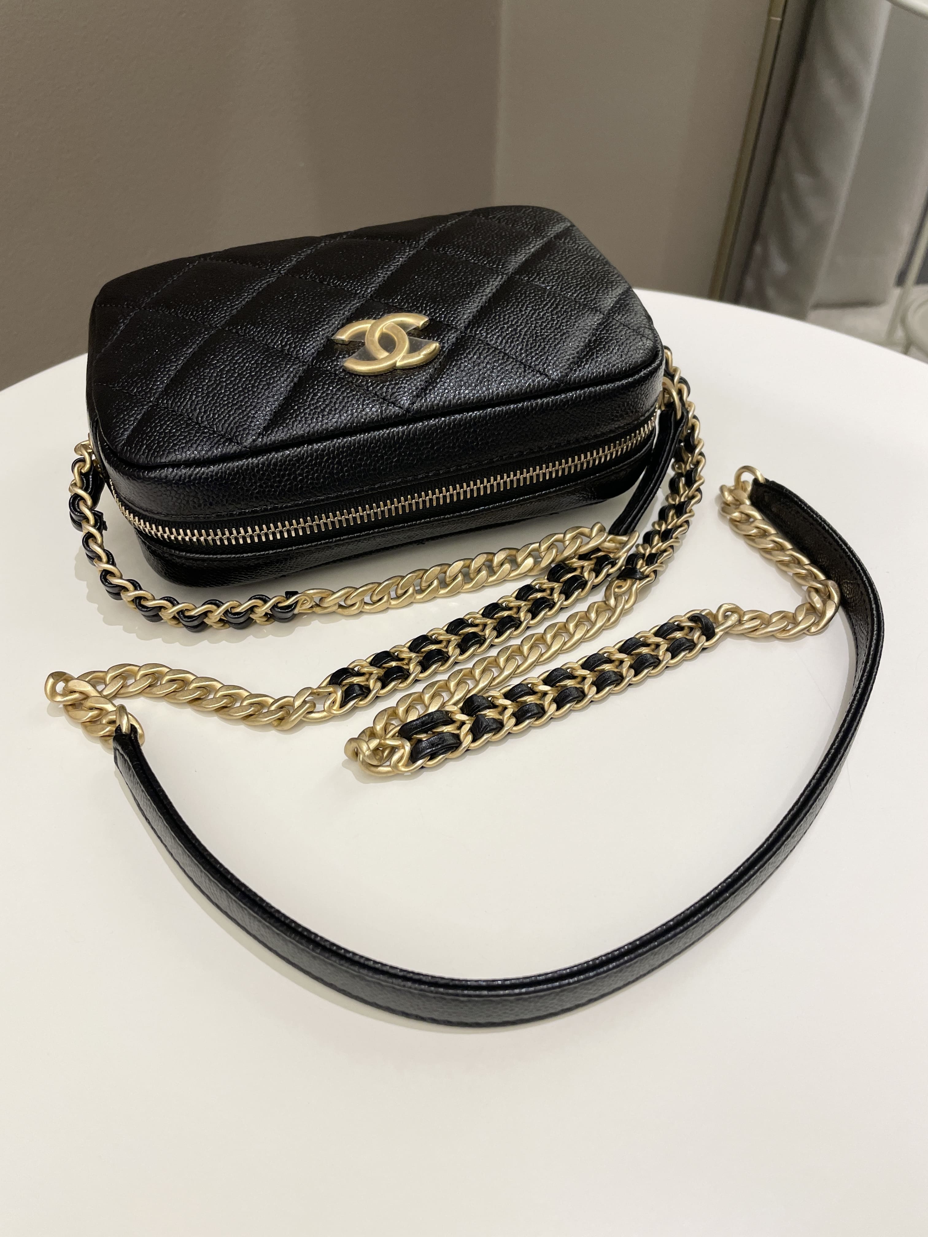 Chanel 22P Quilted Camera Sling Bag Black Caviar