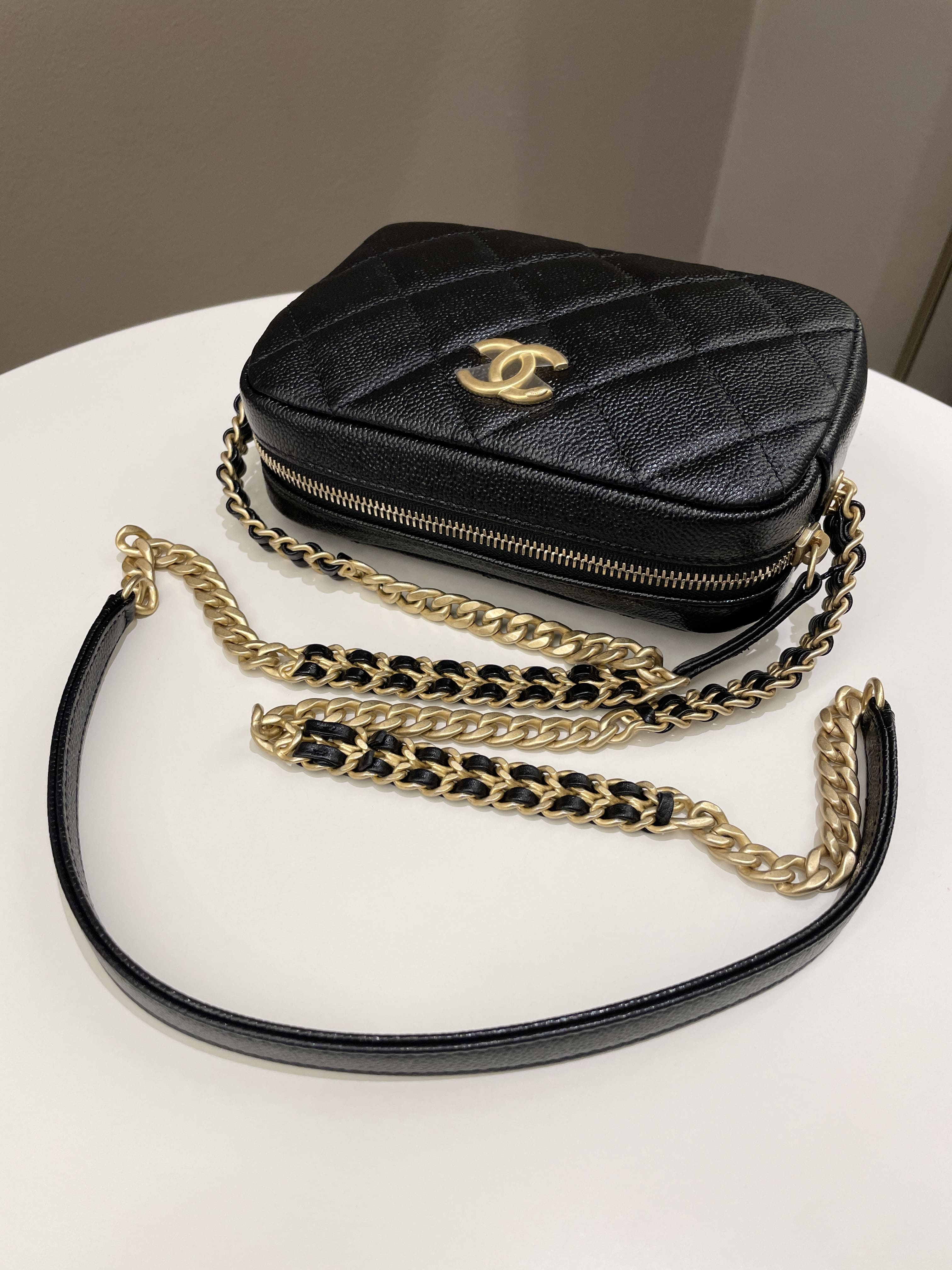 Chanel 22P Quilted Camera Sling Bag Black Caviar