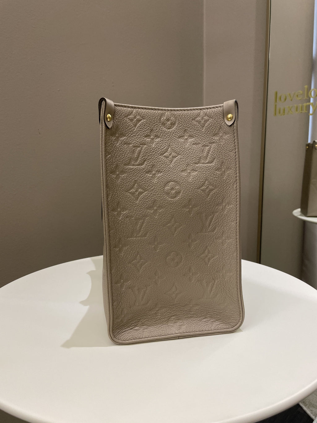 Louis Vuitton OnTheGo MM Tourterelle Empreinte