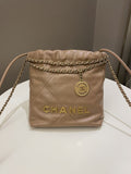 Chanel 23B 22 Mini Hobo Beige Calfskin