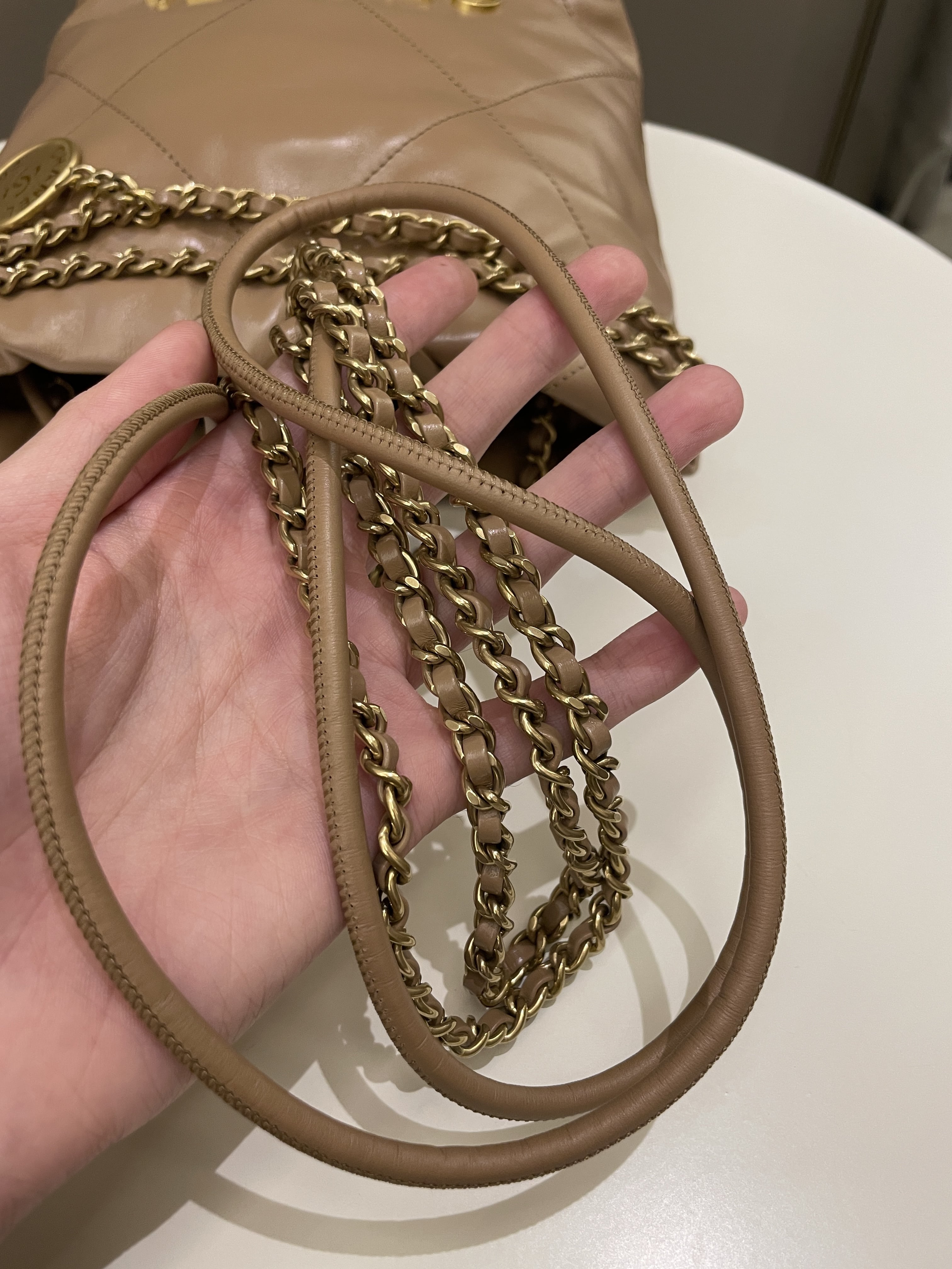 Chanel 23B 22 Mini Hobo Beige Calfskin