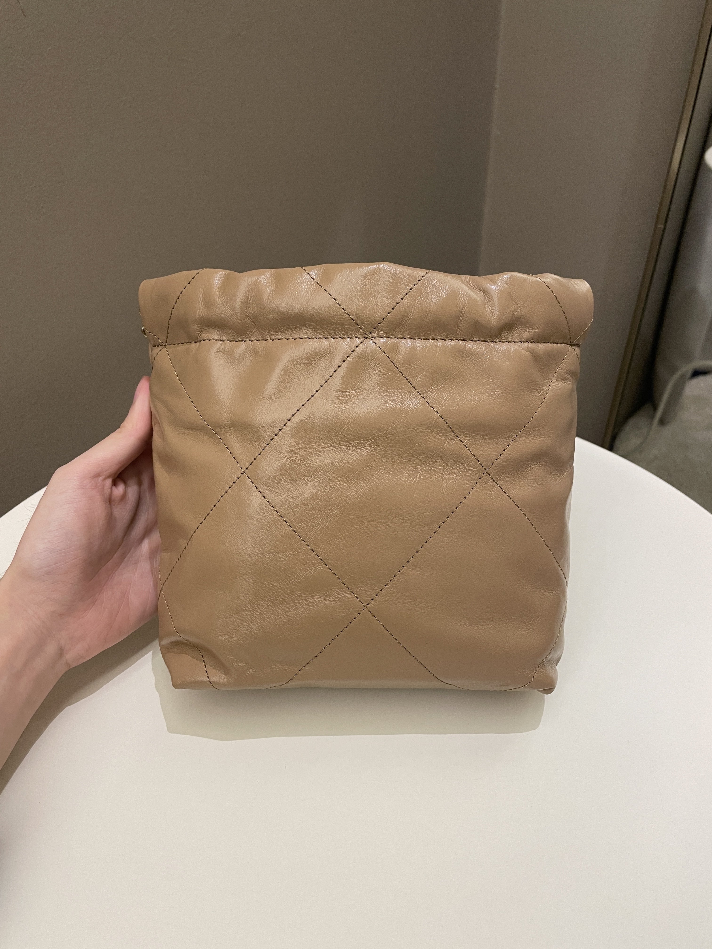 Chanel 23B 22 Mini Hobo Beige Calfskin