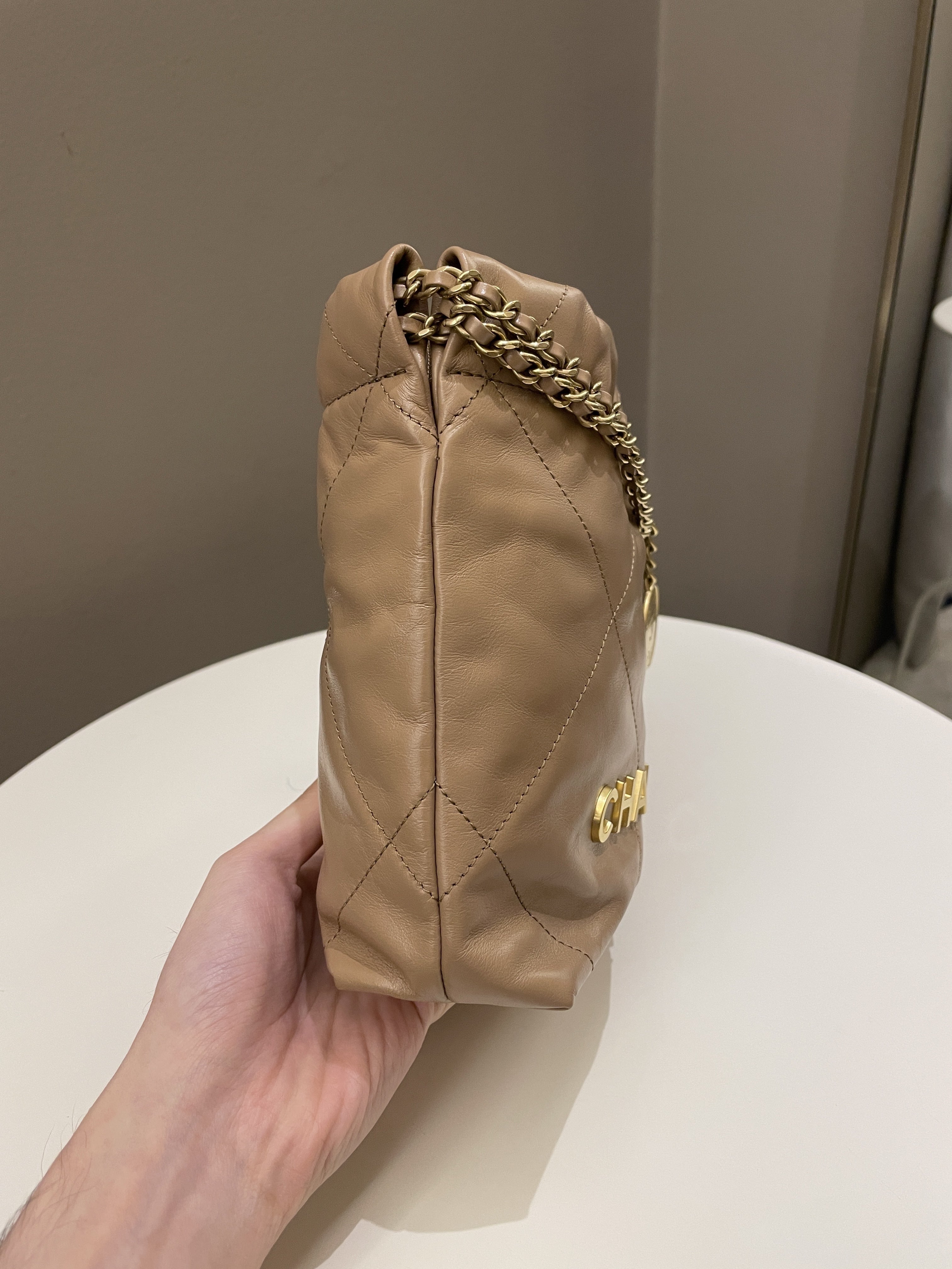 Chanel 23B 22 Mini Hobo Beige Calfskin