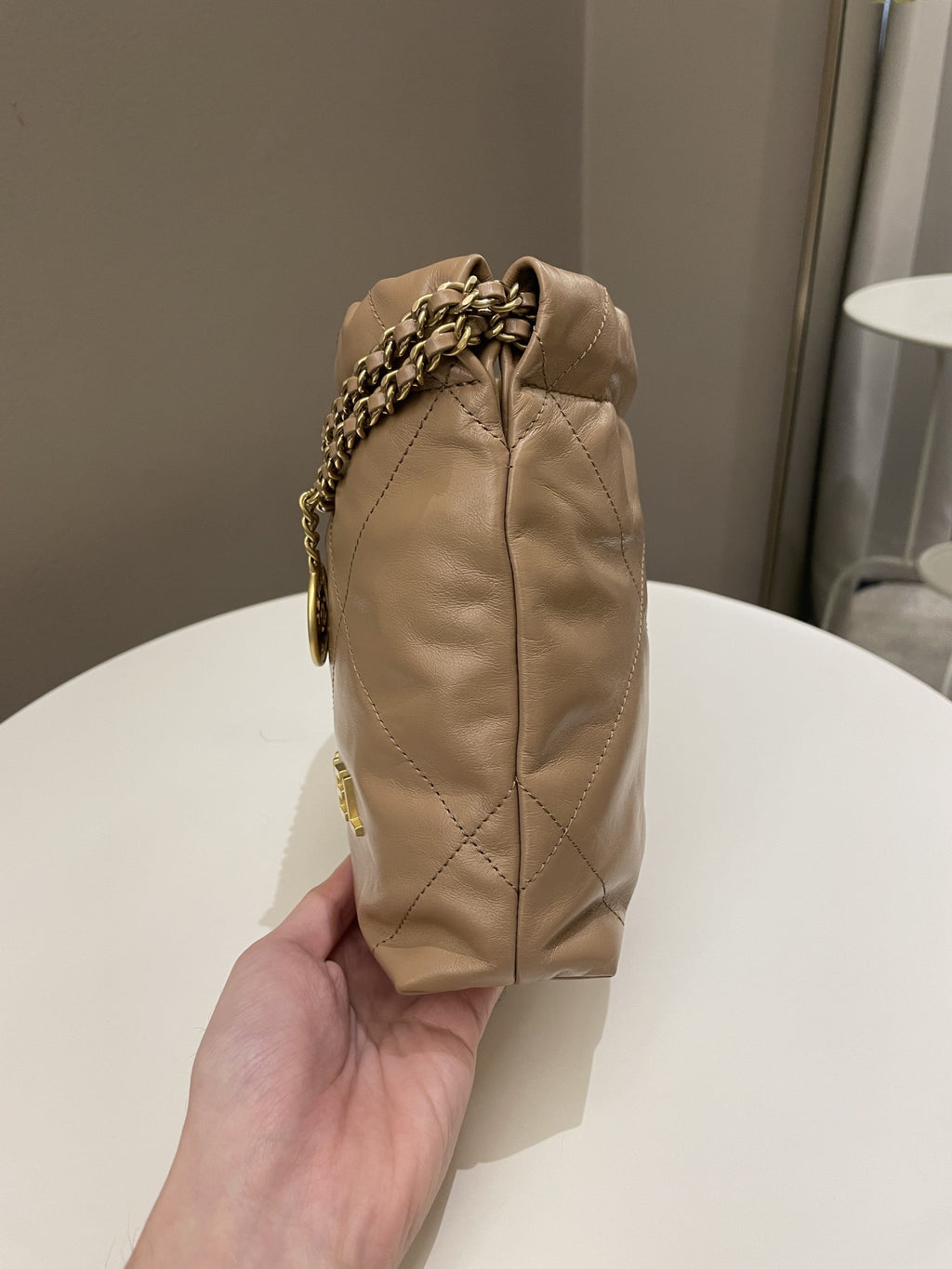 Chanel 23B 22 Mini Hobo Beige Calfskin
