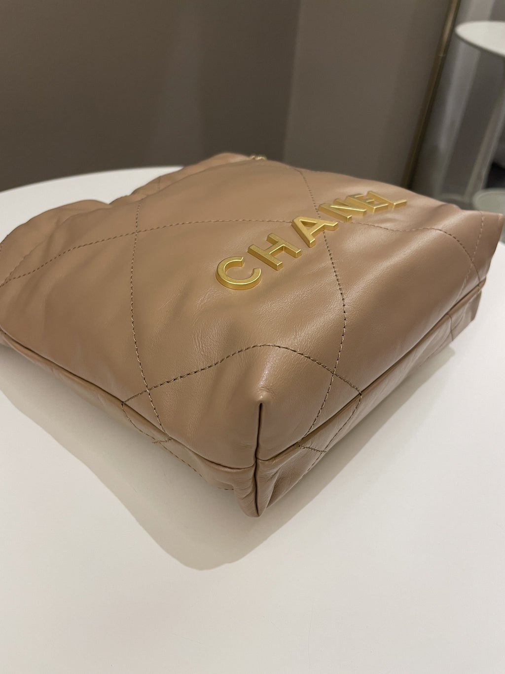 Chanel 23B 22 Mini Hobo Beige Calfskin