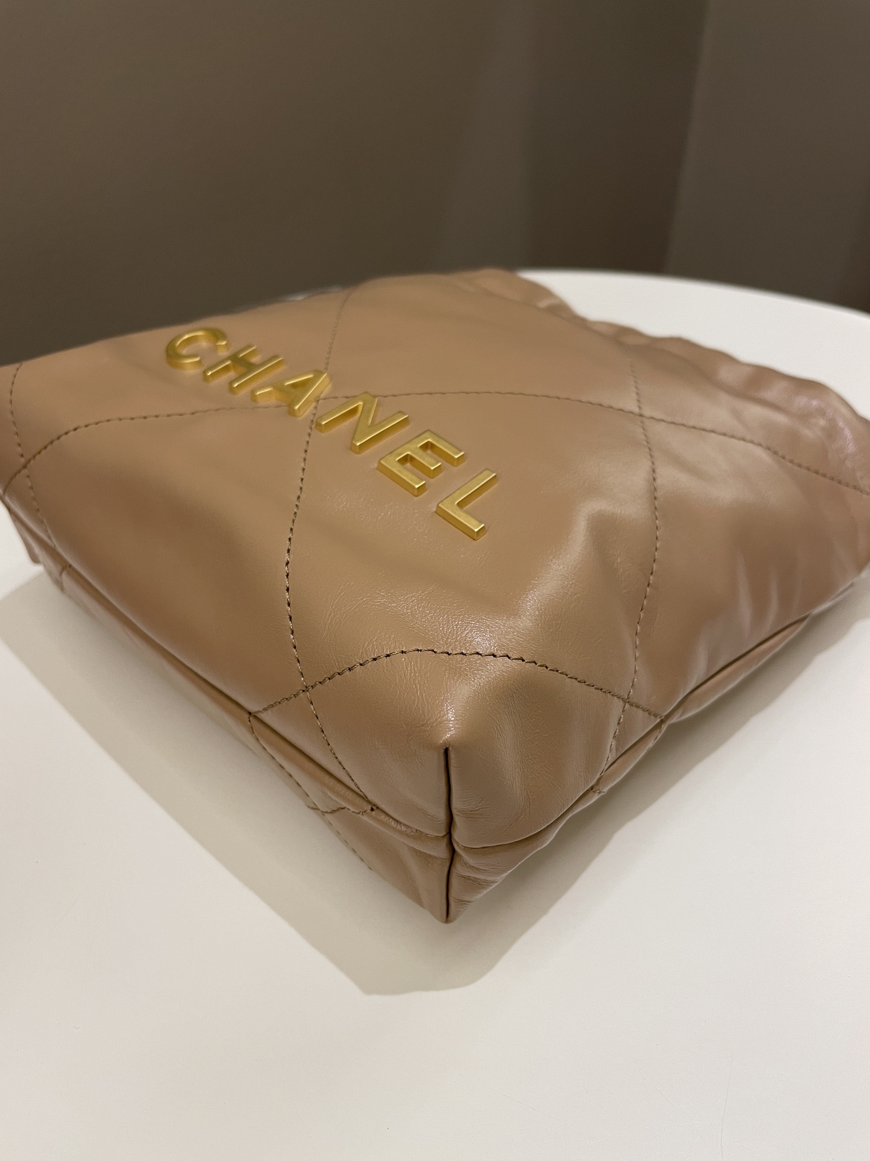 Chanel 23B 22 Mini Hobo Beige Calfskin